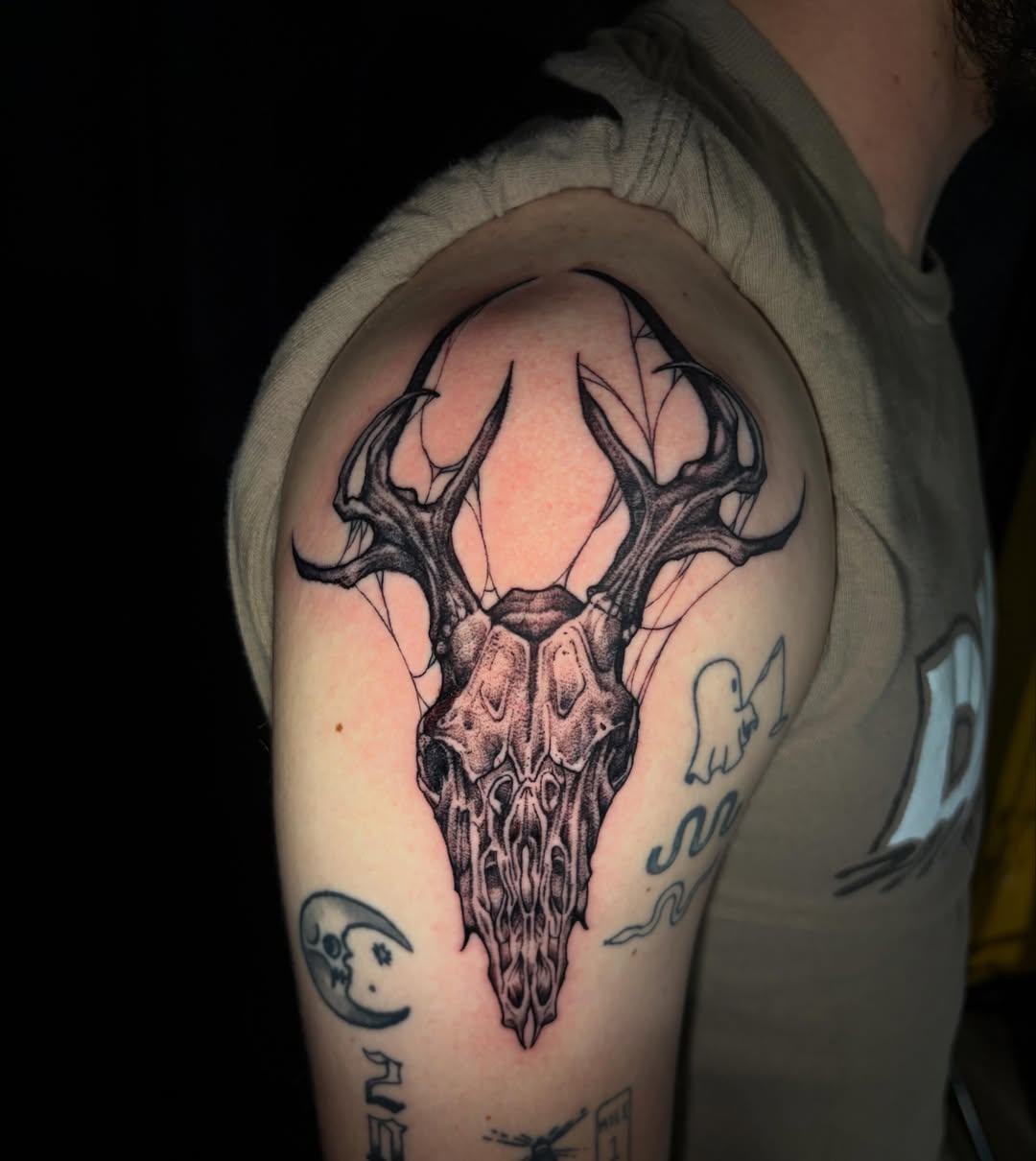 Deer skull realism tattoo on the shoulder by Crawlspacecadet