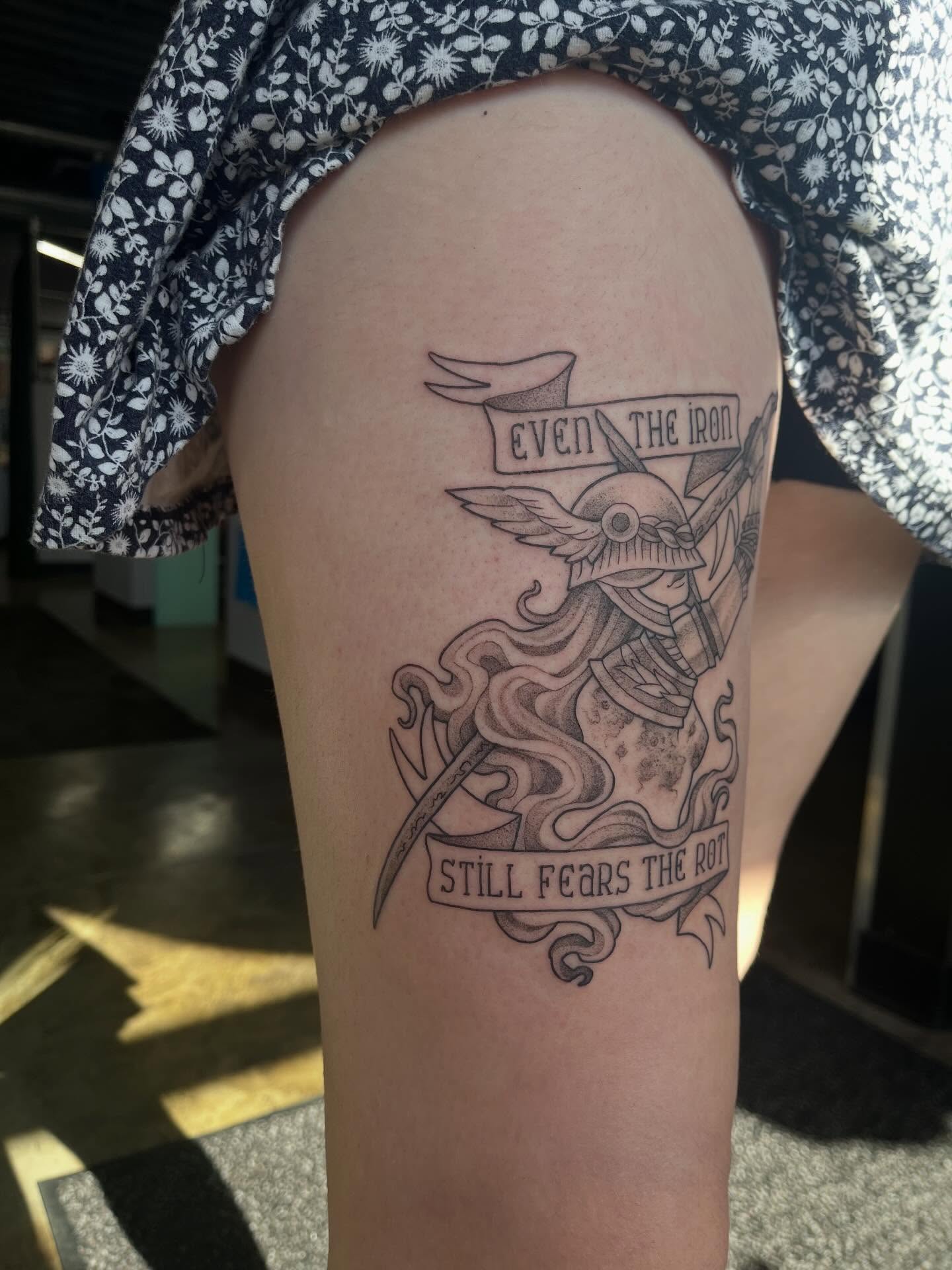 Iron knight black and grey tattoo on the thigh by bunny, Minneapolis, Minnesota