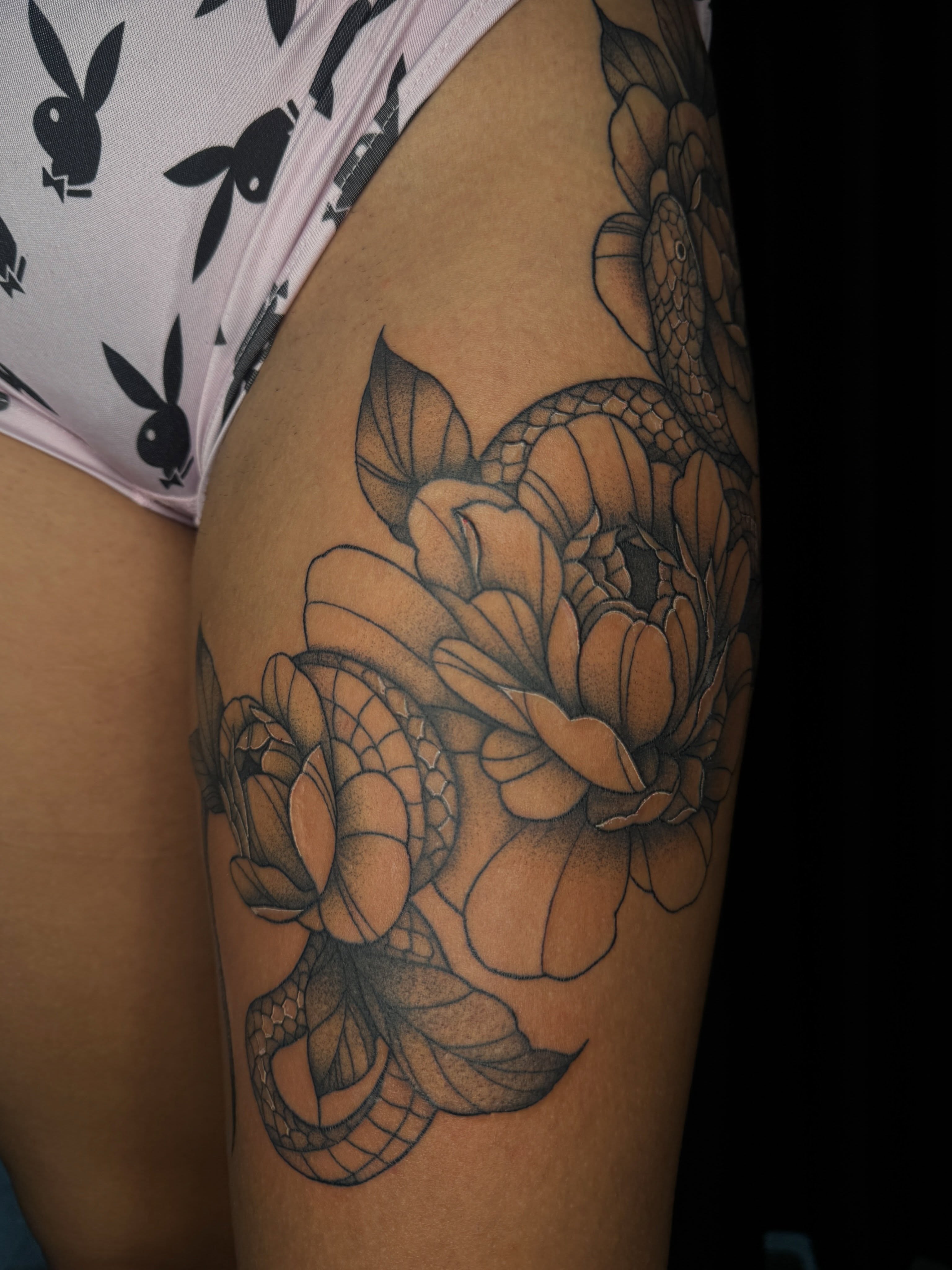 Peony and snake dotwork tattoo on the thigh by ✧˖°. Jordan