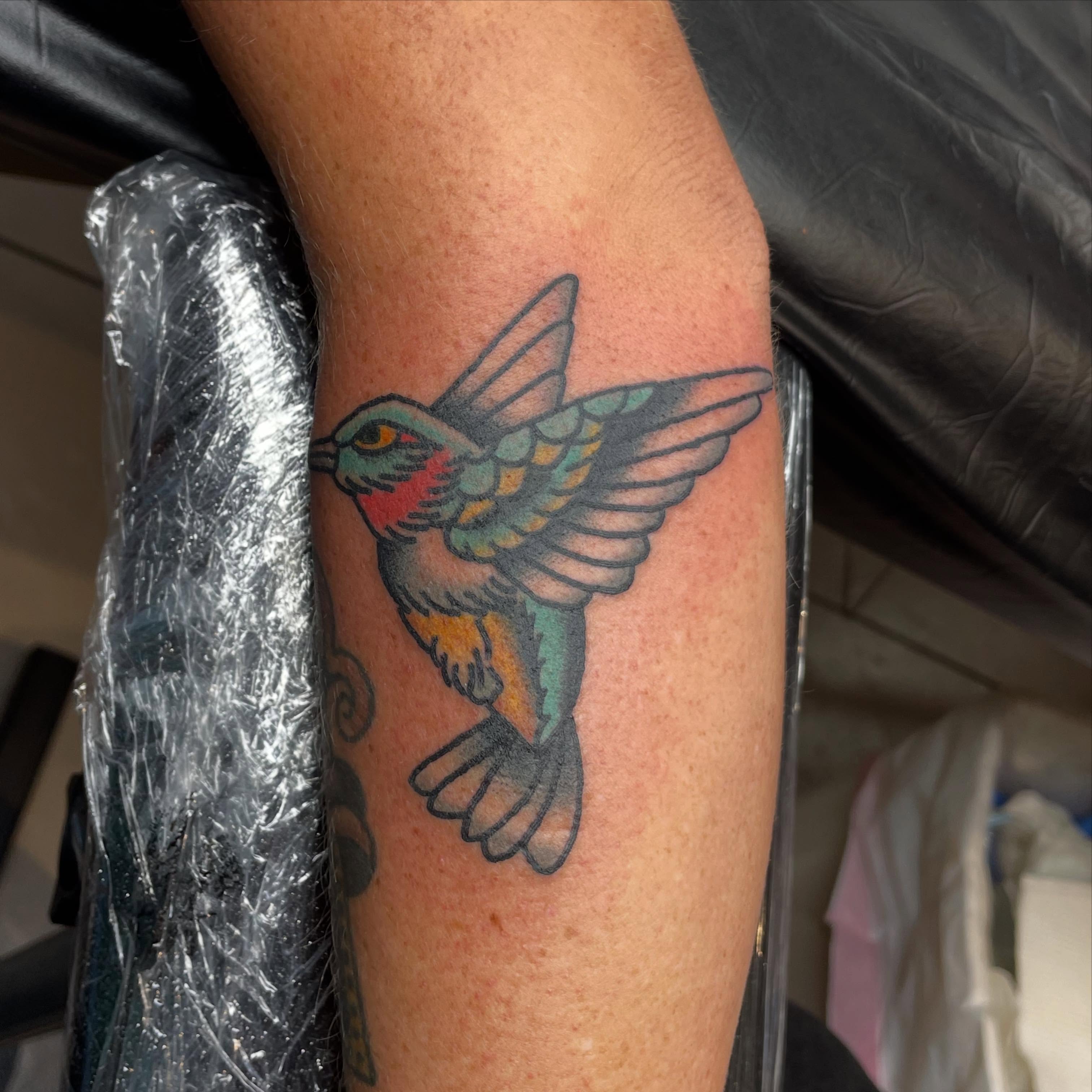 Bird American traditional tattoo on the forearm by Mitchell Willard