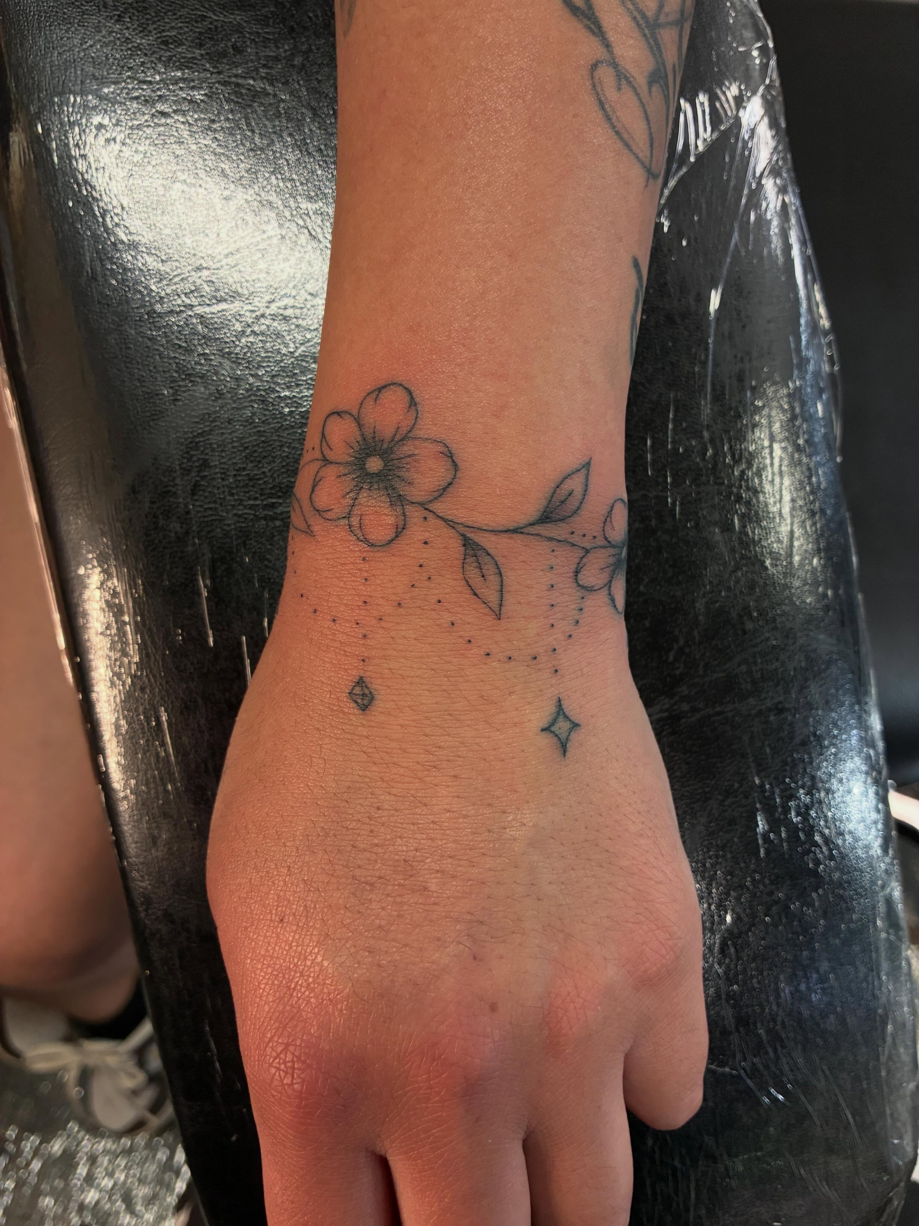 Tattoo by @tattoos.by.julie — dotwork, geometric