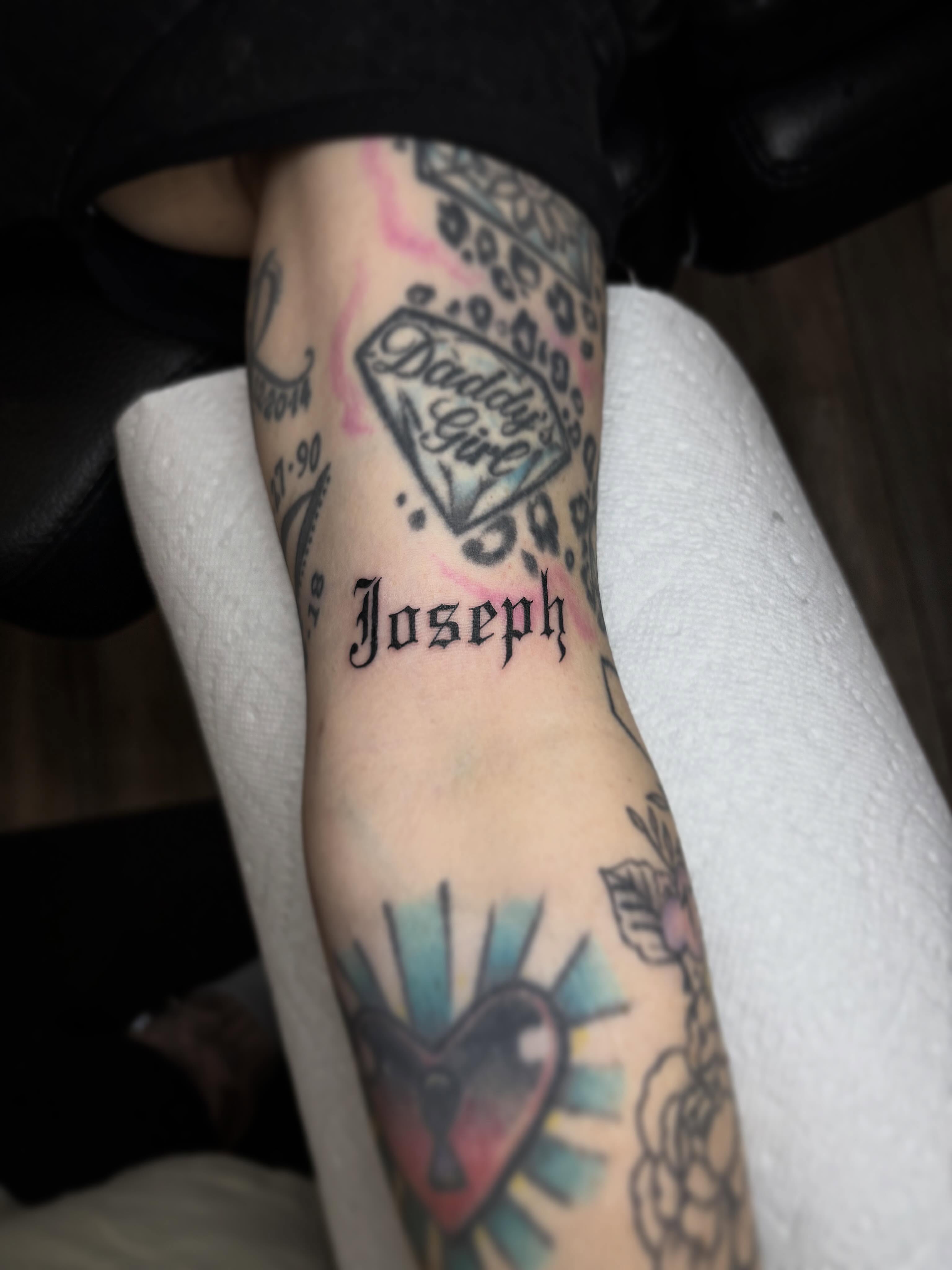 Joseph American traditional tattoo on the forearm by Grace L