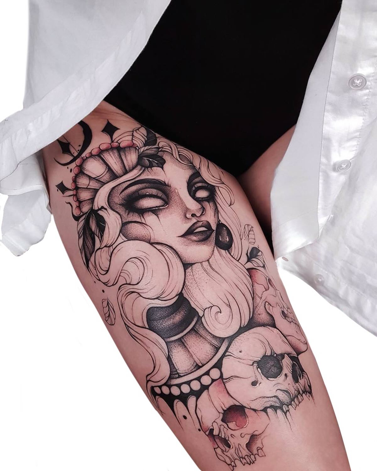 Woman with skull realism tattoo on the thigh by Tattoo Seattle Anime Japanese San Francisco
