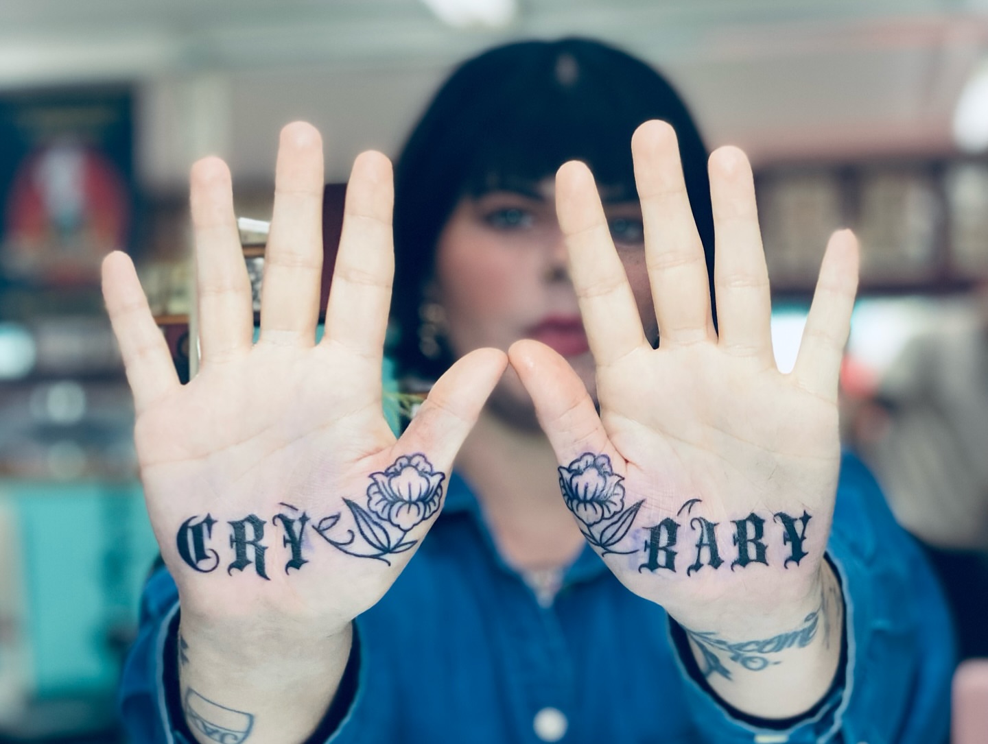 Cry baby American traditional tattoo on the hand by Ramsie Segura-Andrews