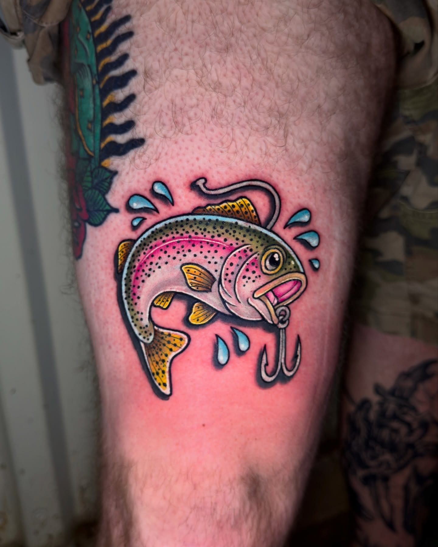 Rainbow trout dotwork tattoo on the thigh by Dylan Fowler