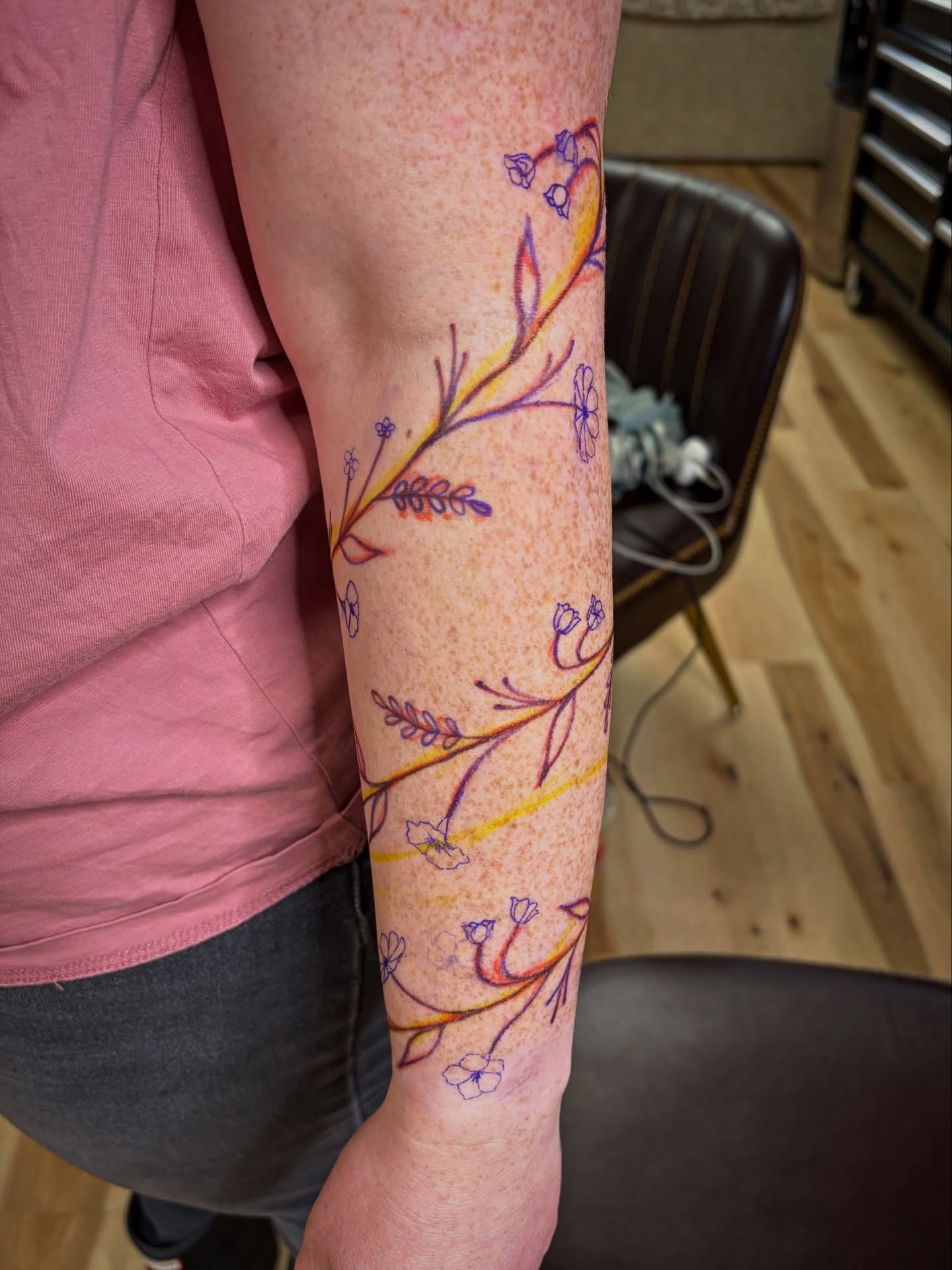 Floral vine fine line tattoo on the forearm by Francesca Siwa