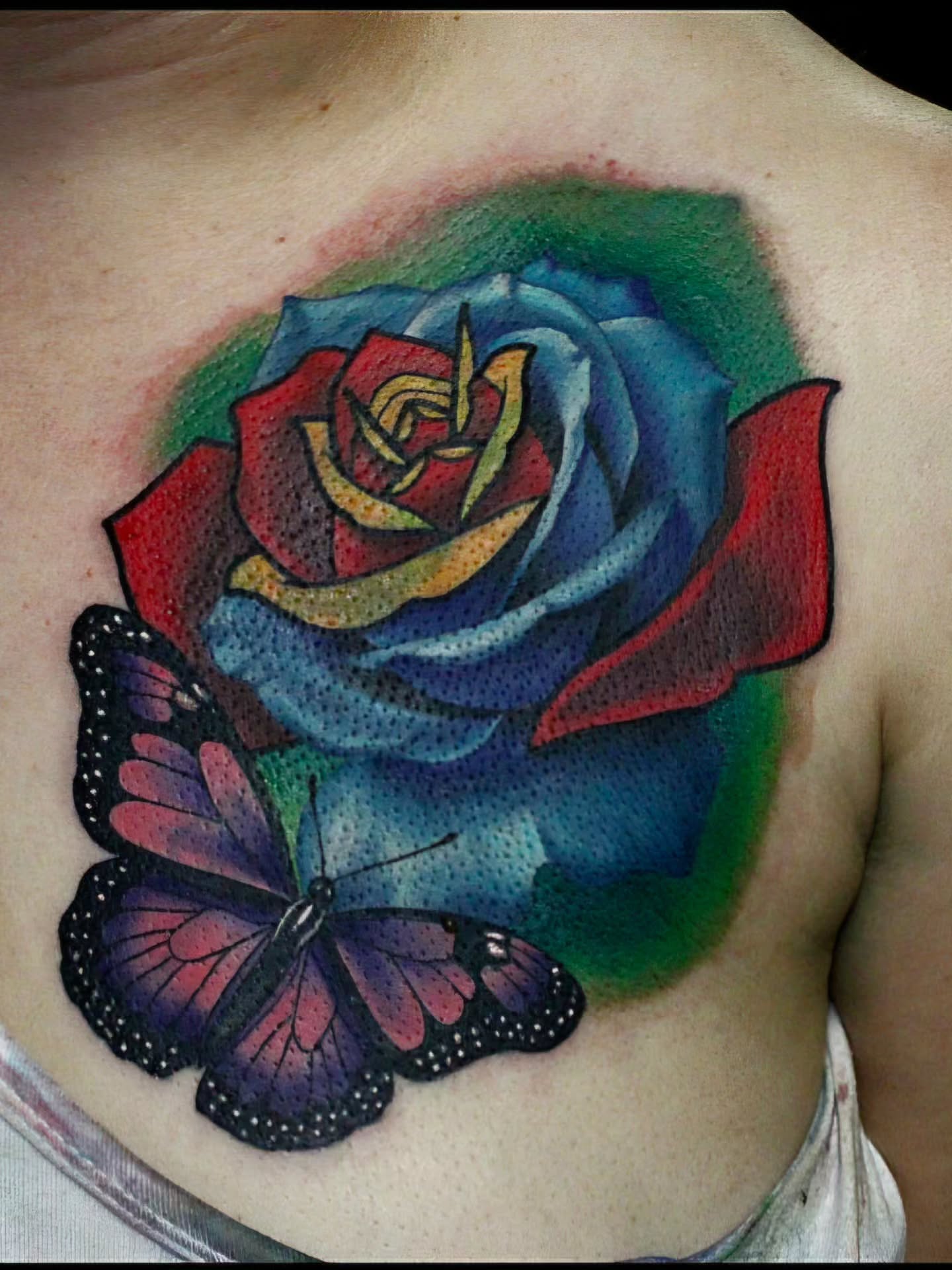 Rose and butterfly dotwork tattoo on the chest by Joey Vinci, Phoenix, Arizona