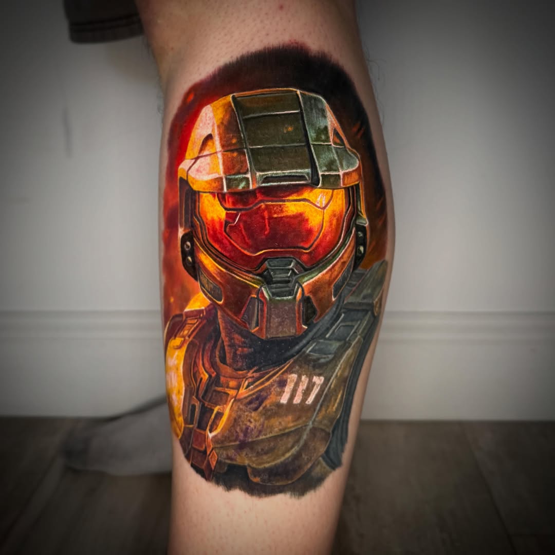 Master chief helmet realism tattoo on the forearm by TJ Schunemann