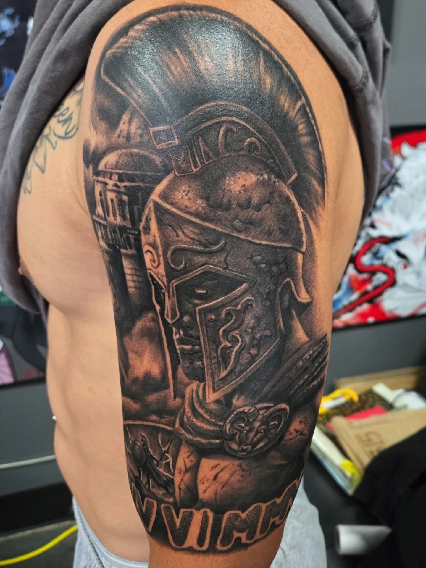 Gladiator helmet realism tattoo on the shoulder by Cee Vann, Greensboro, North Carolina
