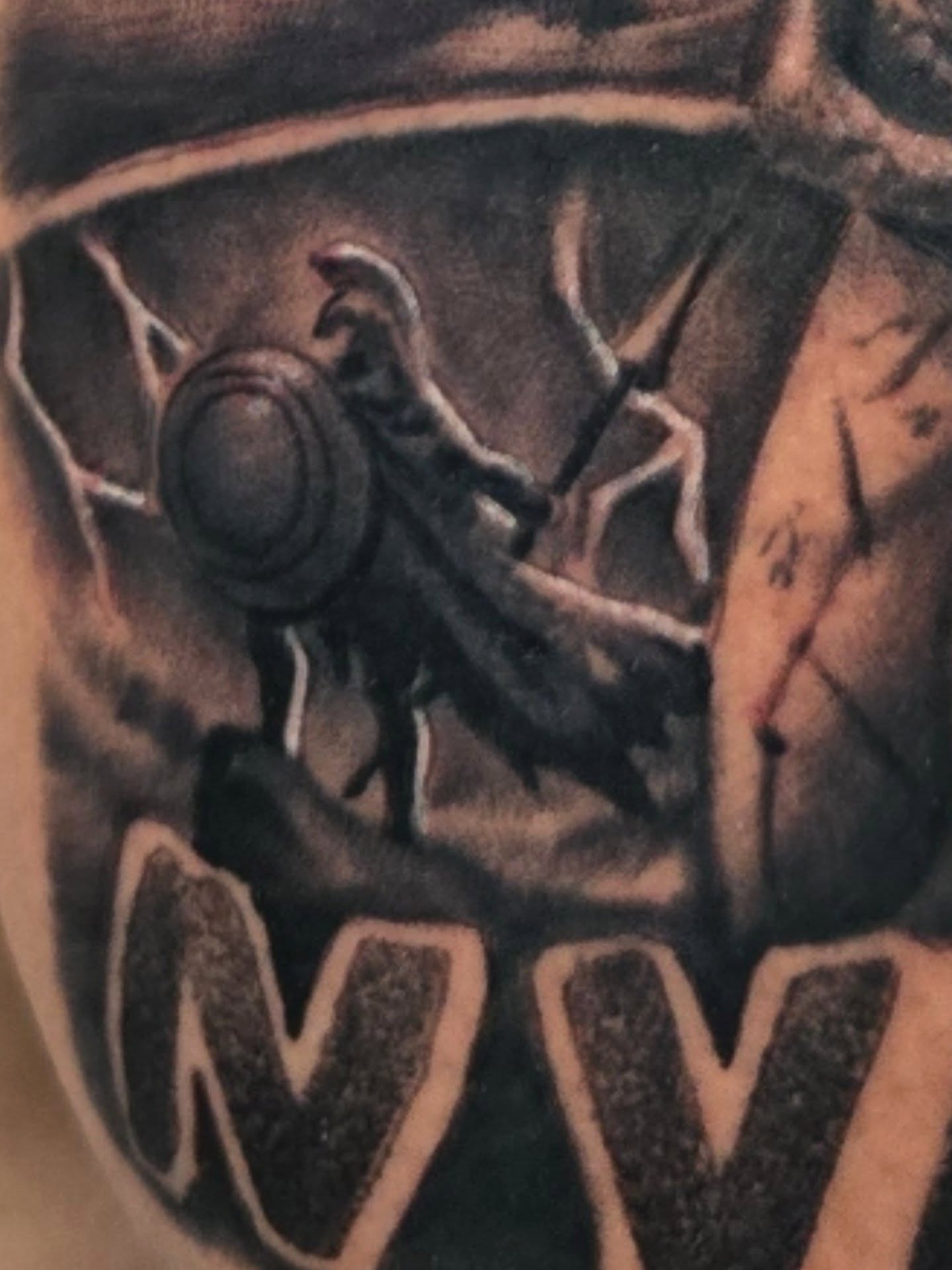 Raven black and grey tattoo on the forearm by Cee Vann, Greensboro, North Carolina