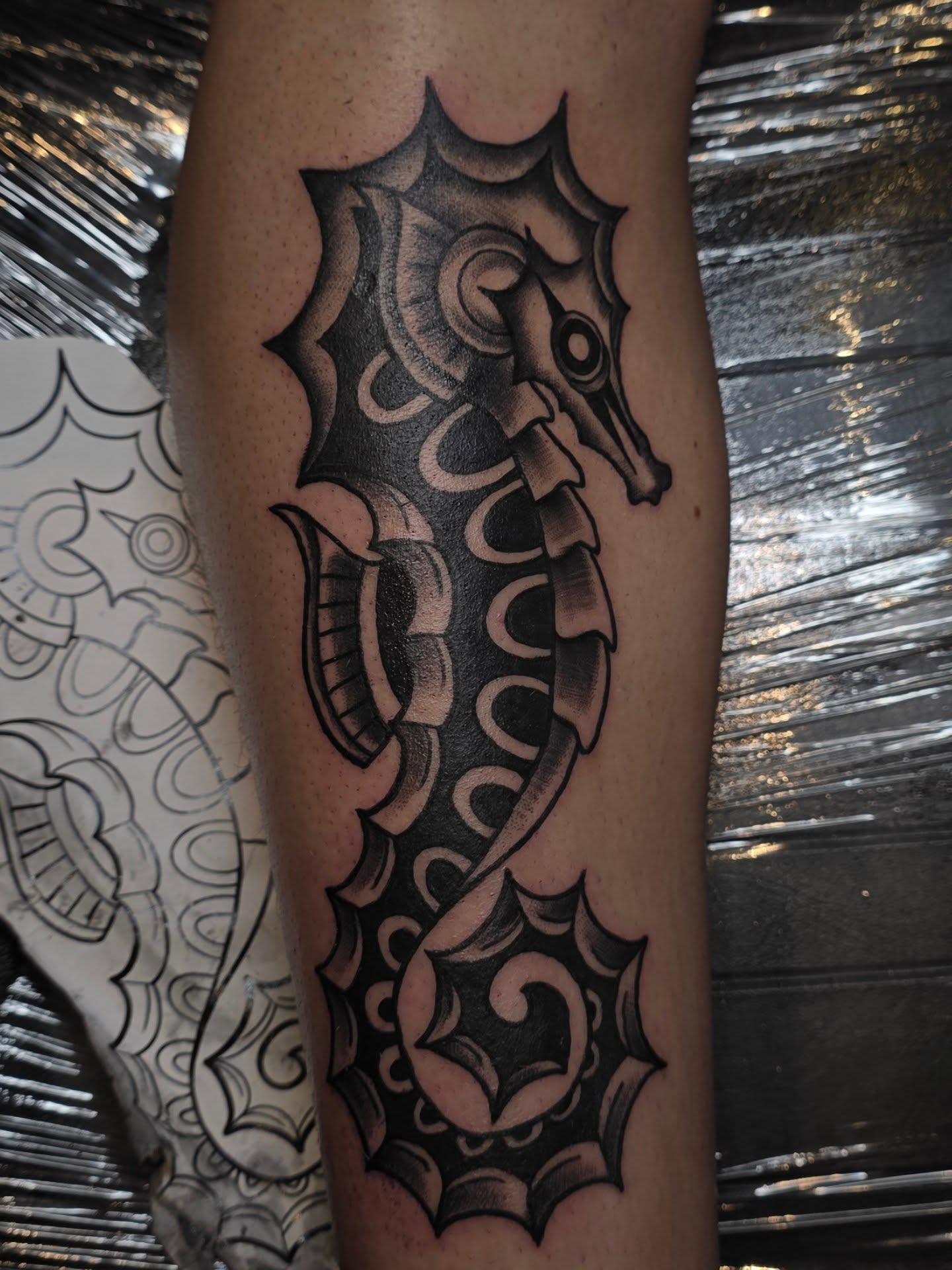 Seahorse black and grey tattoo on the forearm by Kayla Williams