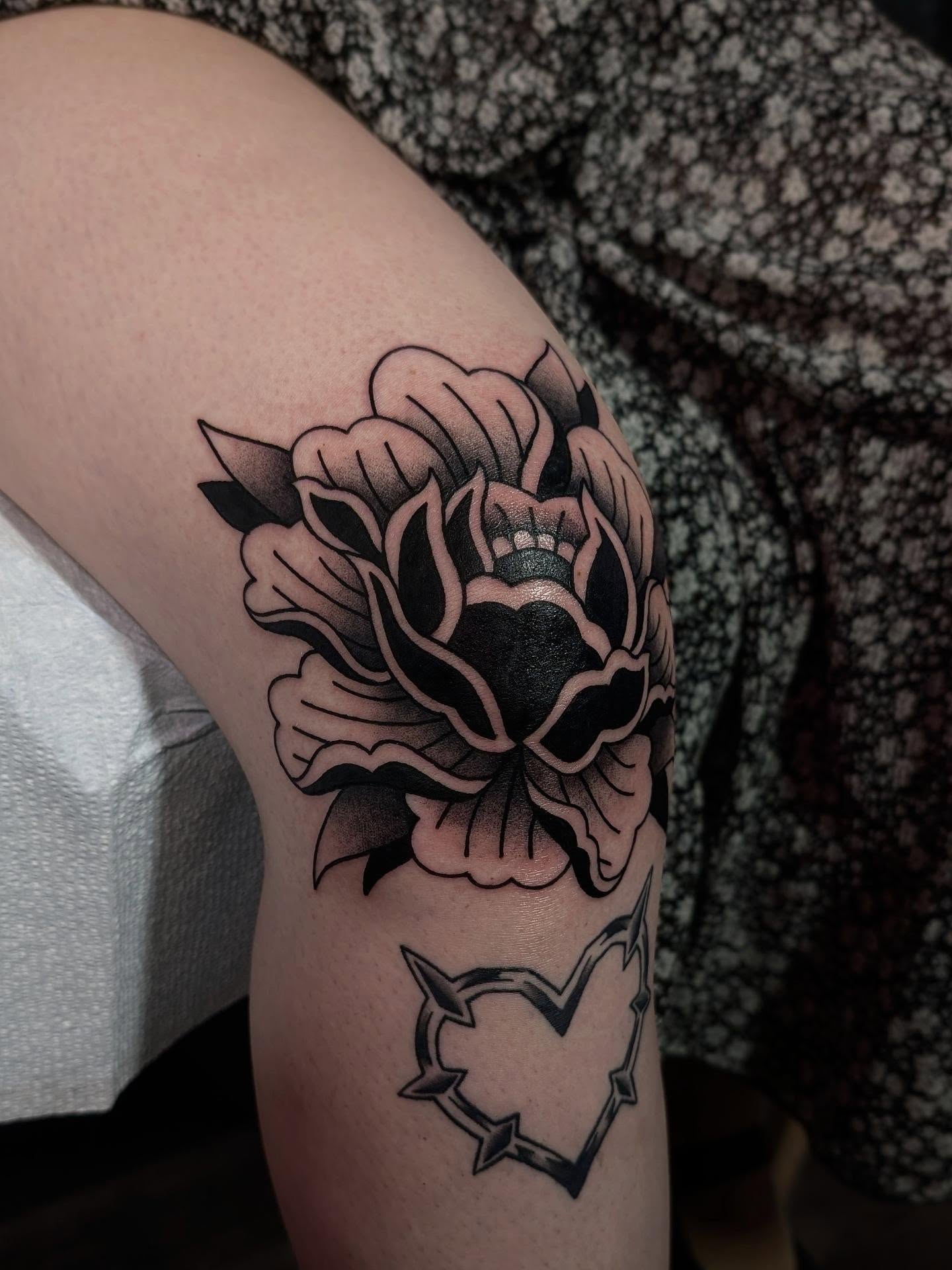 Lotus flower American traditional tattoo on the thigh by ᴇʟɪsᴇ
