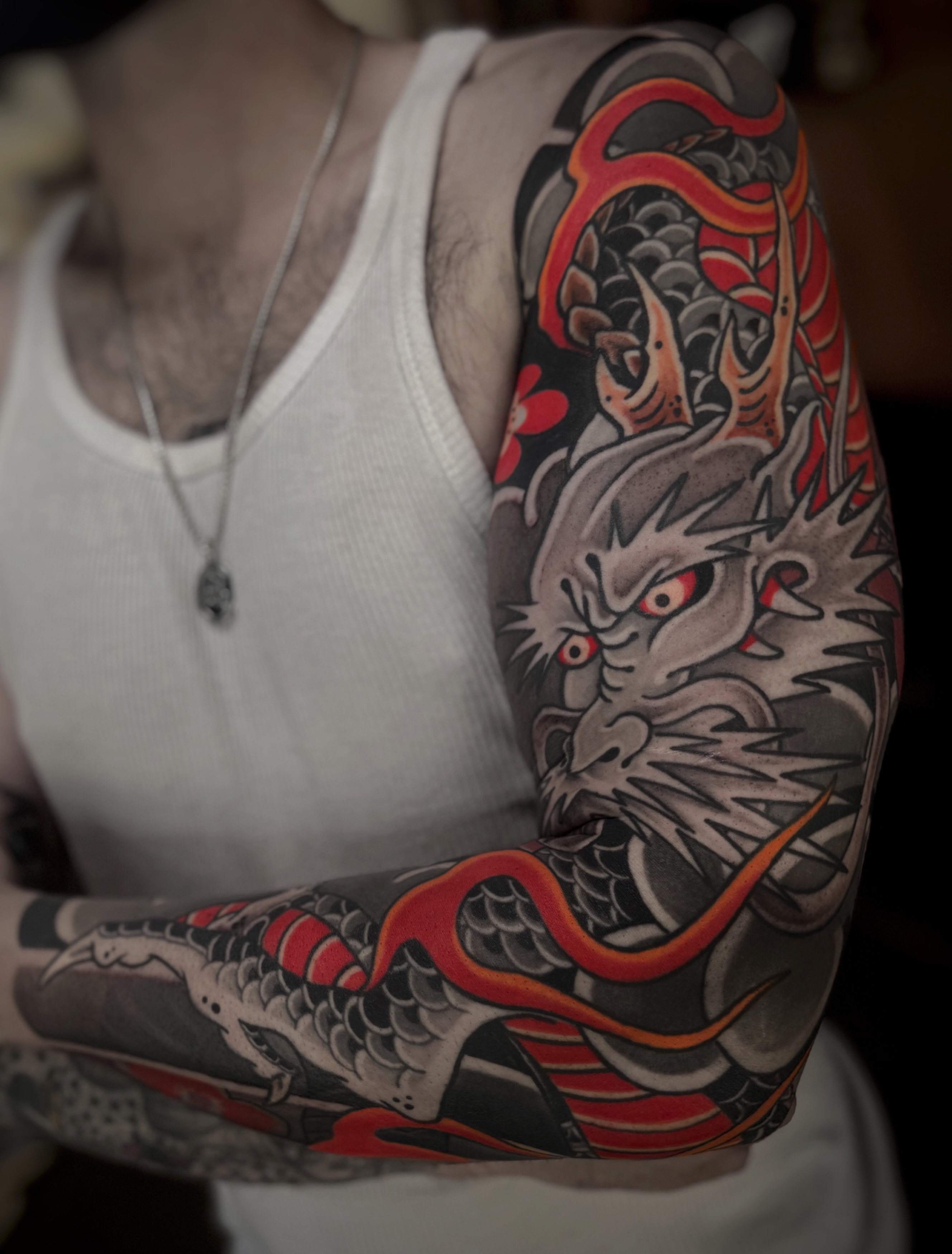 Dragon japanese irezumi tattoo on the upper arm by Aitor Arie, Roseville, California