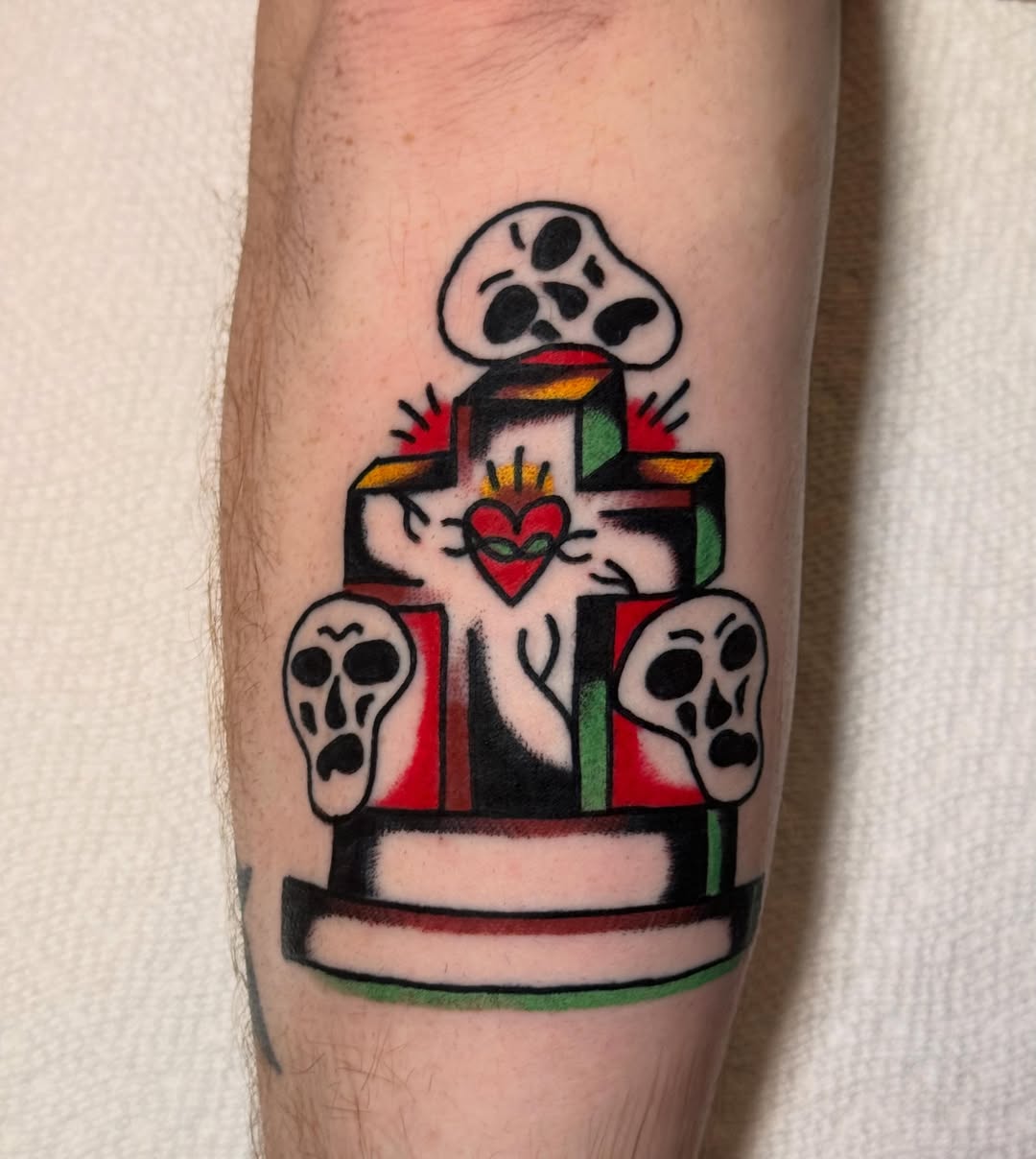 Skeleton and heart American traditional tattoo on the forearm by Zach Lemieux