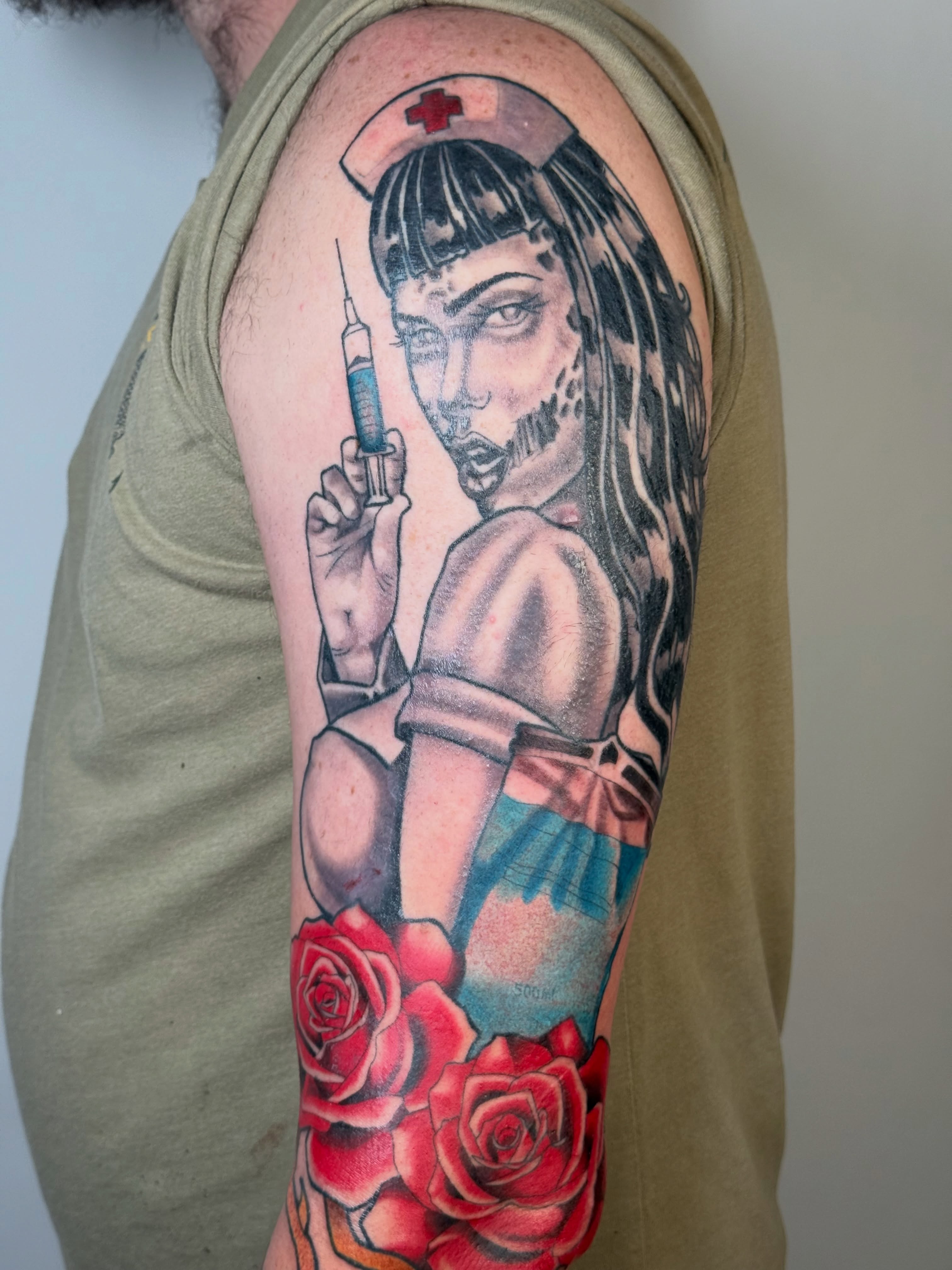 Nurse with syringe realism tattoo on the forearm by autumn sky