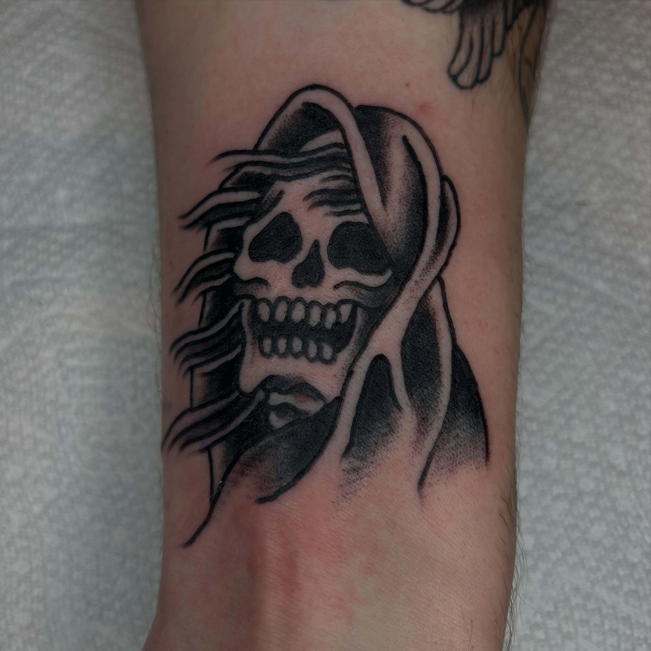 Skull black and grey tattoo on the forearm by Casey Lewis - Tattoo Artist, Cleveland Ohio