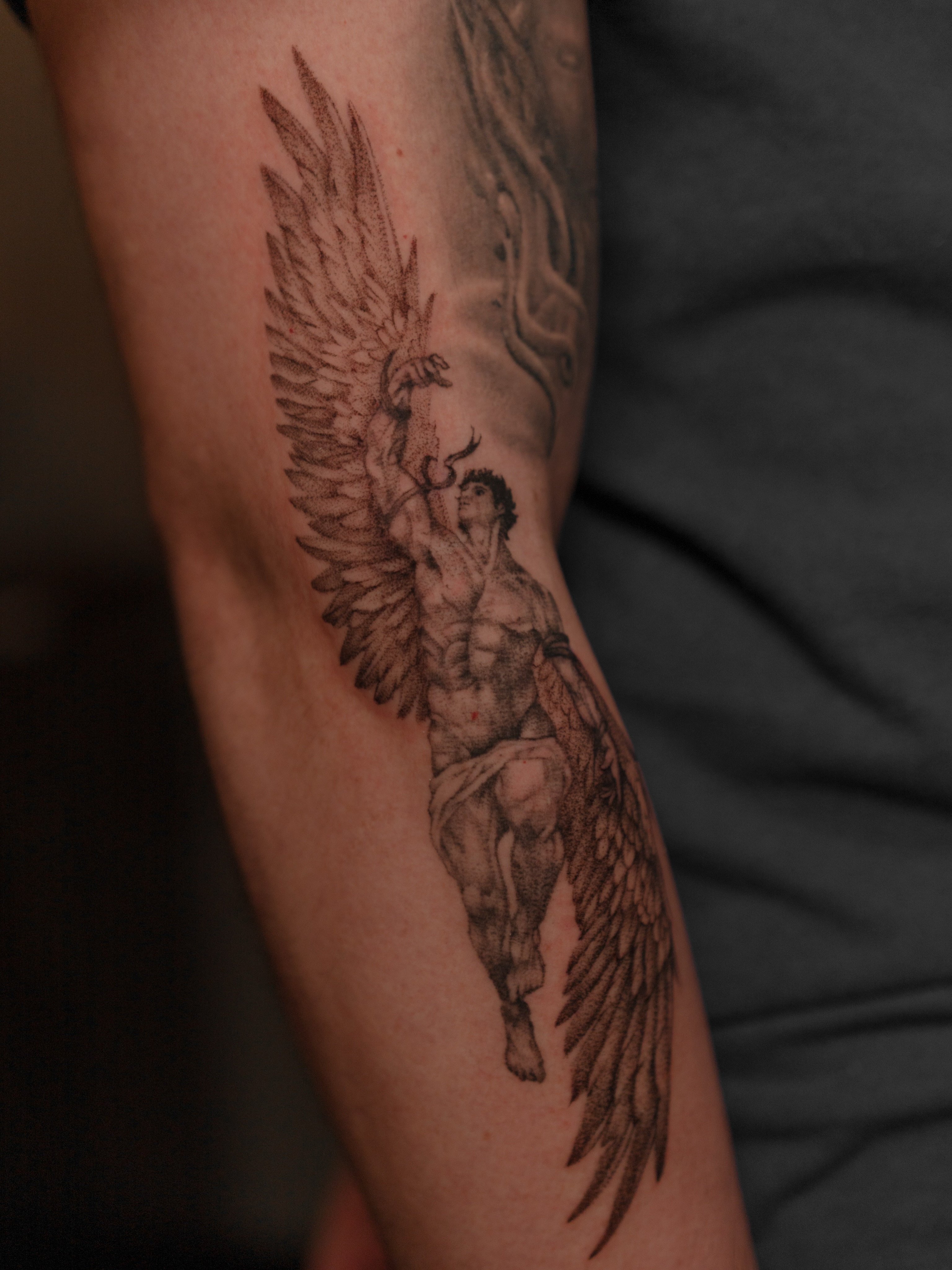 Angelic figure dotwork tattoo on the forearm by Jen- San Antonio tattoo artist