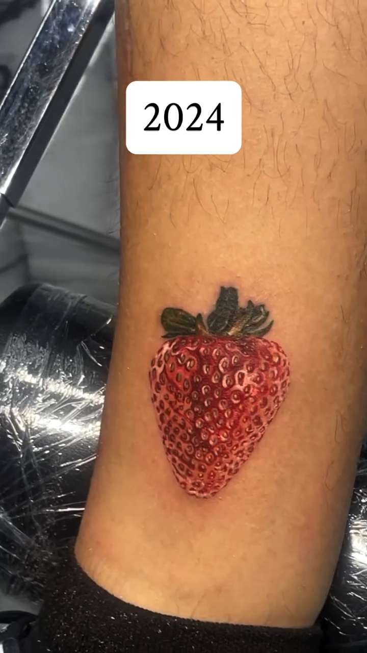 Strawberry realism tattoo by Austin Jones