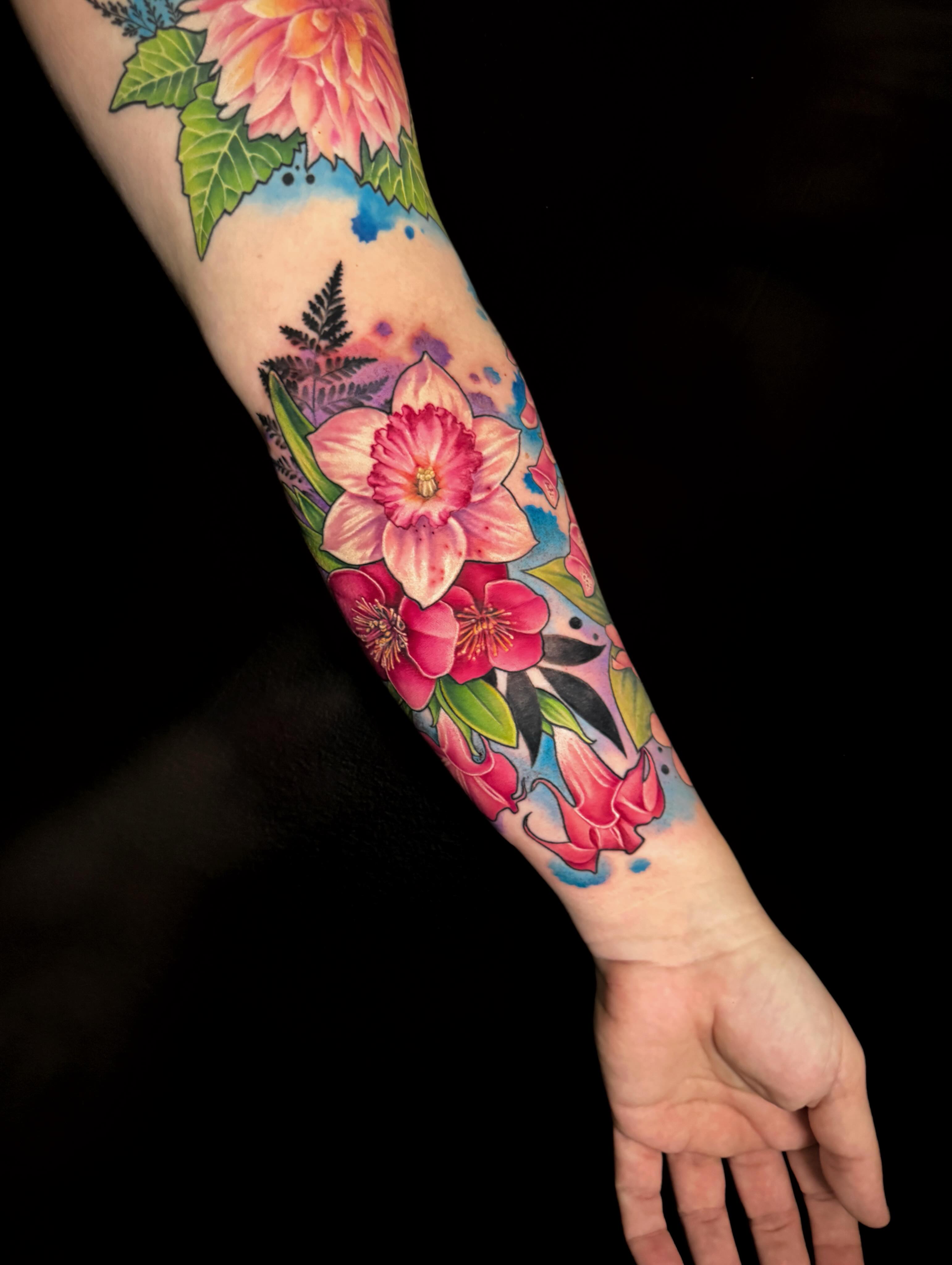 Floral arrangement watercolor tattoo on the forearm by Violet Michelle Williams, Charlotte, North Carolina