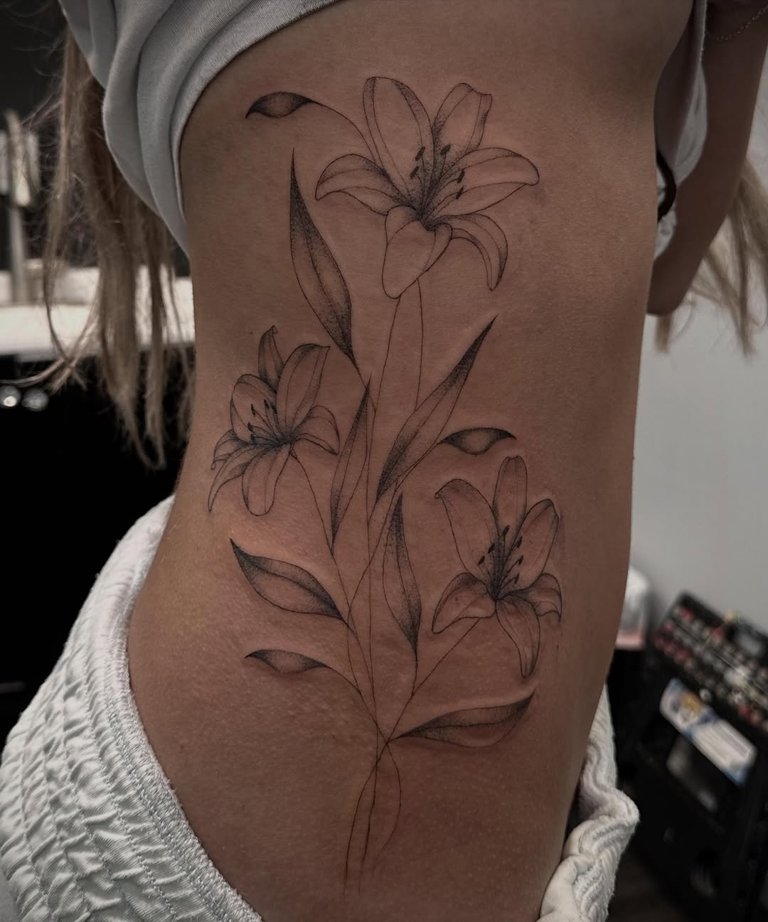 Tattoo by @izabella.tattoos — fine_line, black_and_grey