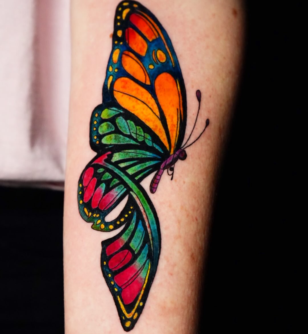 Tattoo by @rayvin_tattoos — watercolor