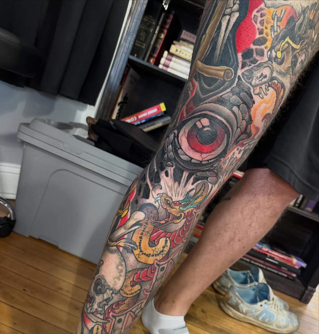Eye and dragon American traditional tattoo on the forearm by Kyle Behr