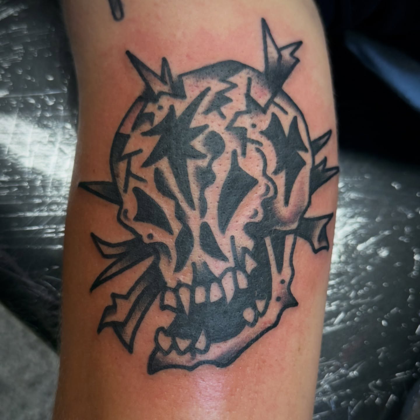 Skull black and grey tattoo on the forearm by Chuck Paprocki, Nashville, Tennessee