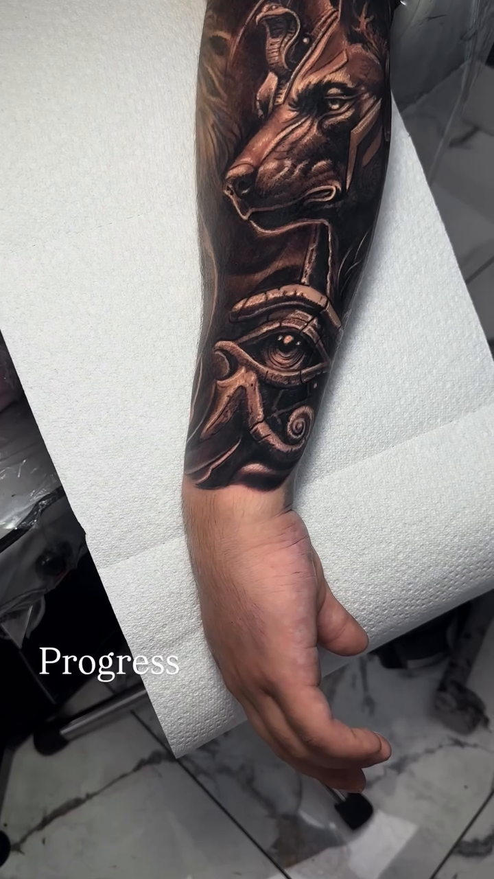Anubis head and Egyptian eye realism tattoo on the forearm by π¨π»βπ¨Ever luis Rivero π¨π»βπ¨