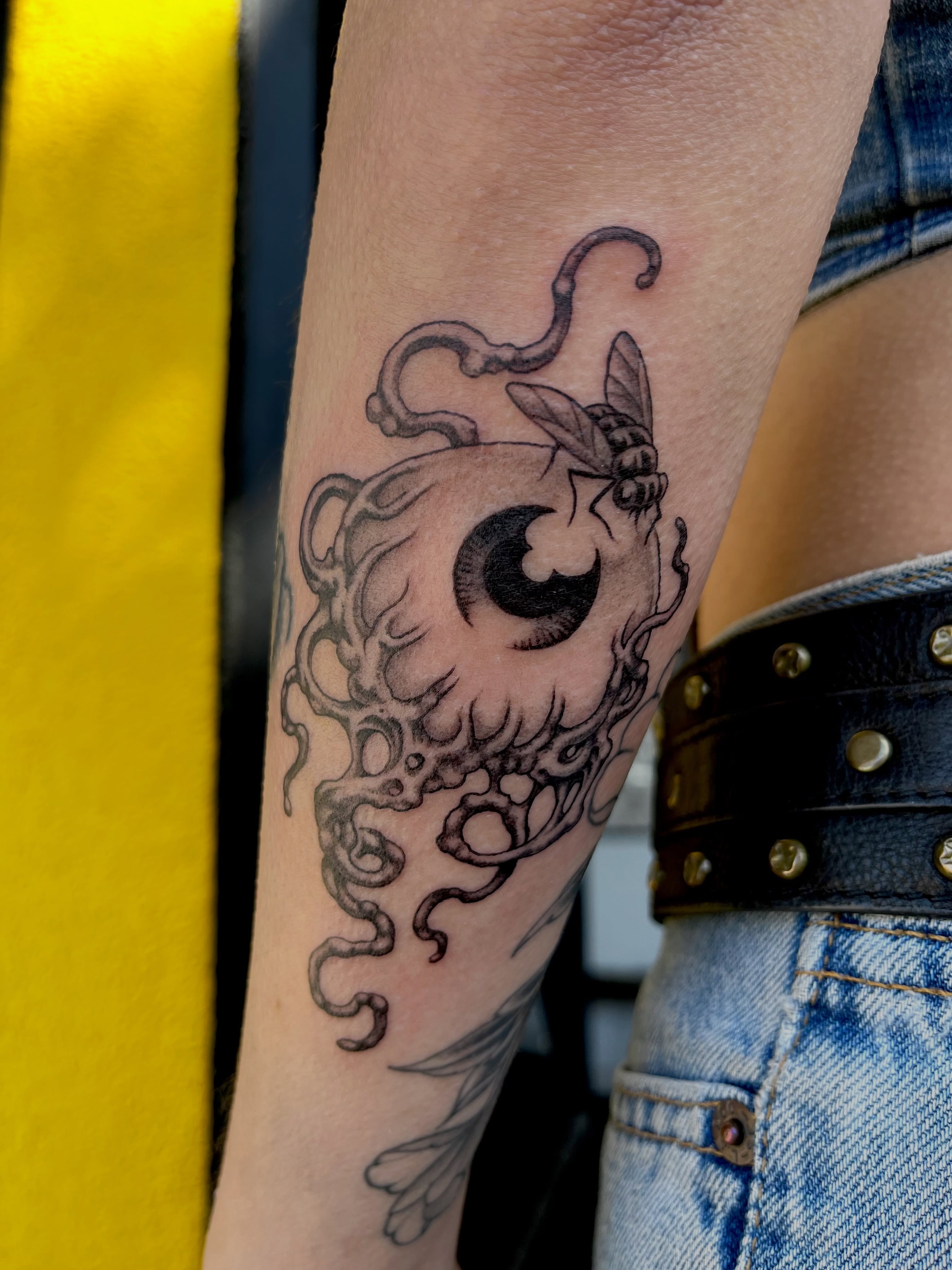 Octopus black and grey tattoo on the forearm by Campbell Zane Alexander