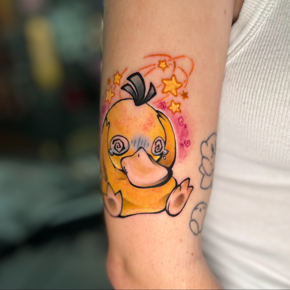 Chibi duck watercolor tattoo on the forearm by Maara Martinez
