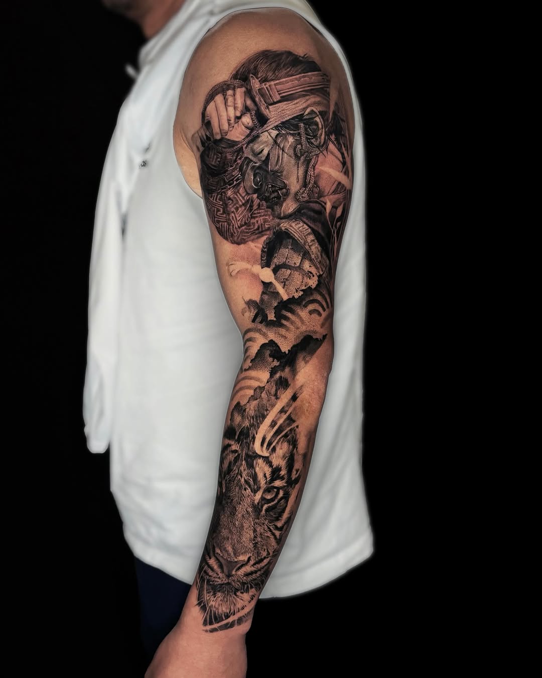 Samurai warrior and tiger Japanese tattoo on the forearm by Yu Chen