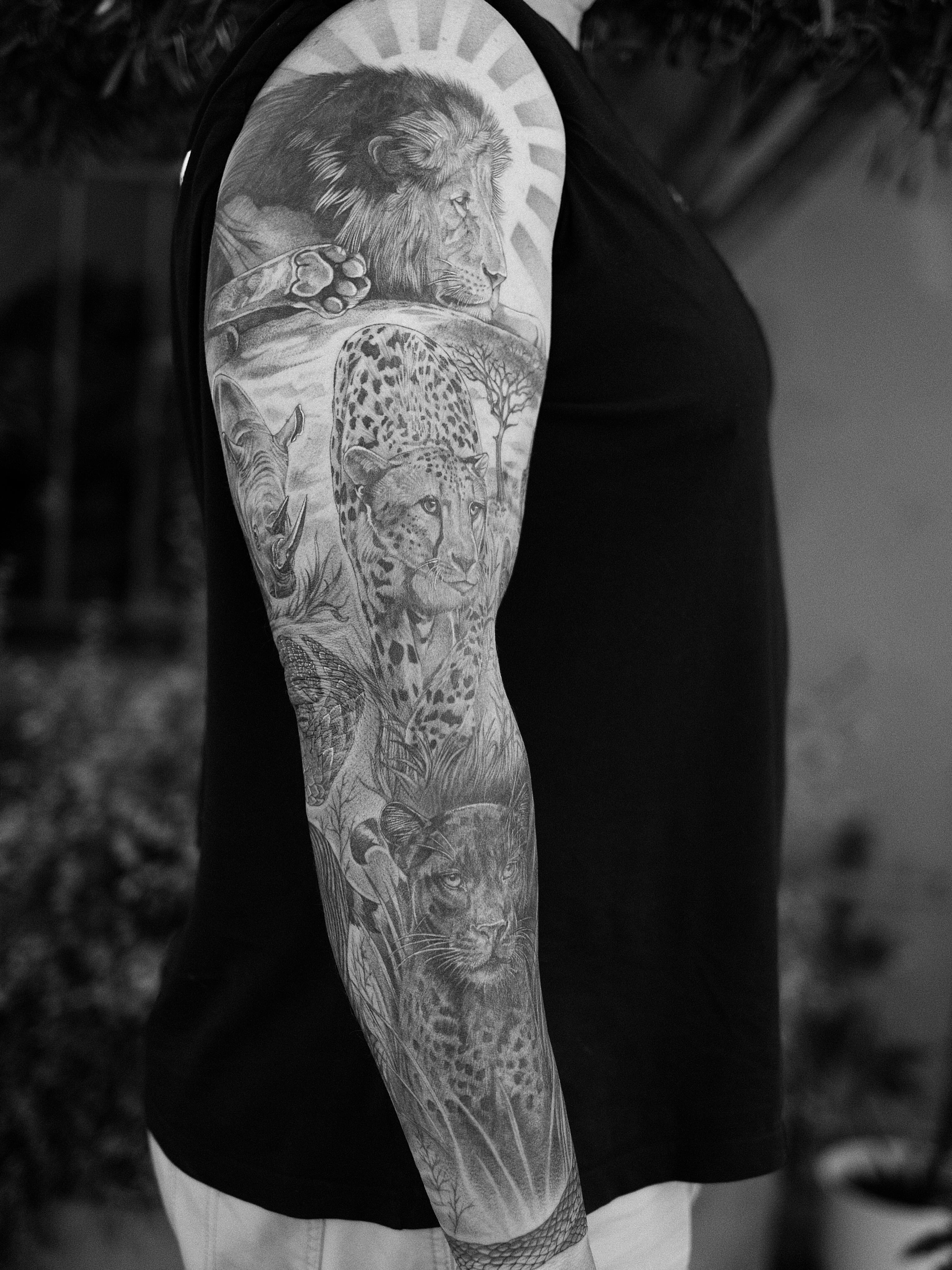Big cat family realism tattoo on the forearm by Isabelle Kellar, San Diego, California