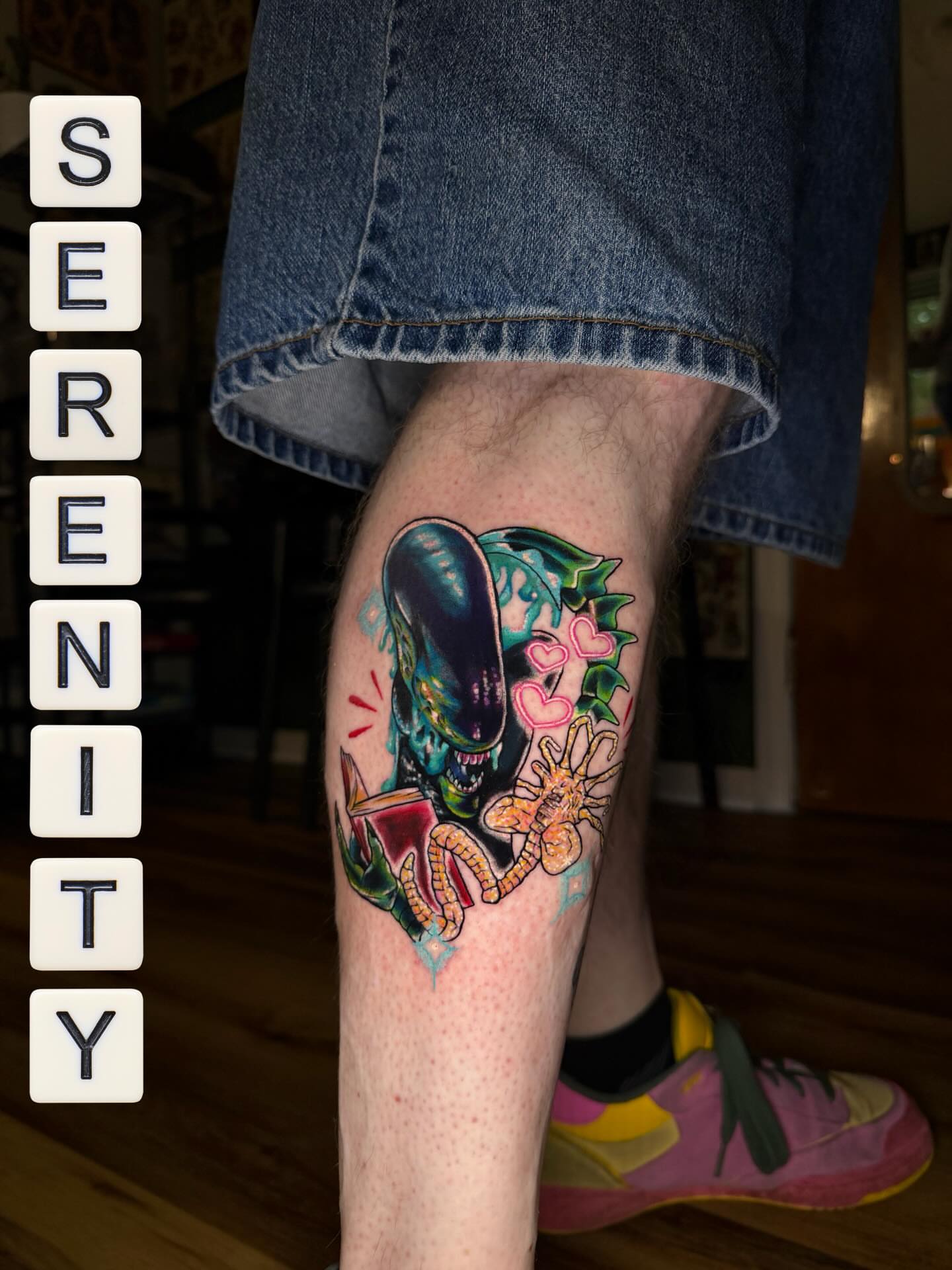 Alien head with flowers new school tattoo on the thigh by Serenity Mullins
