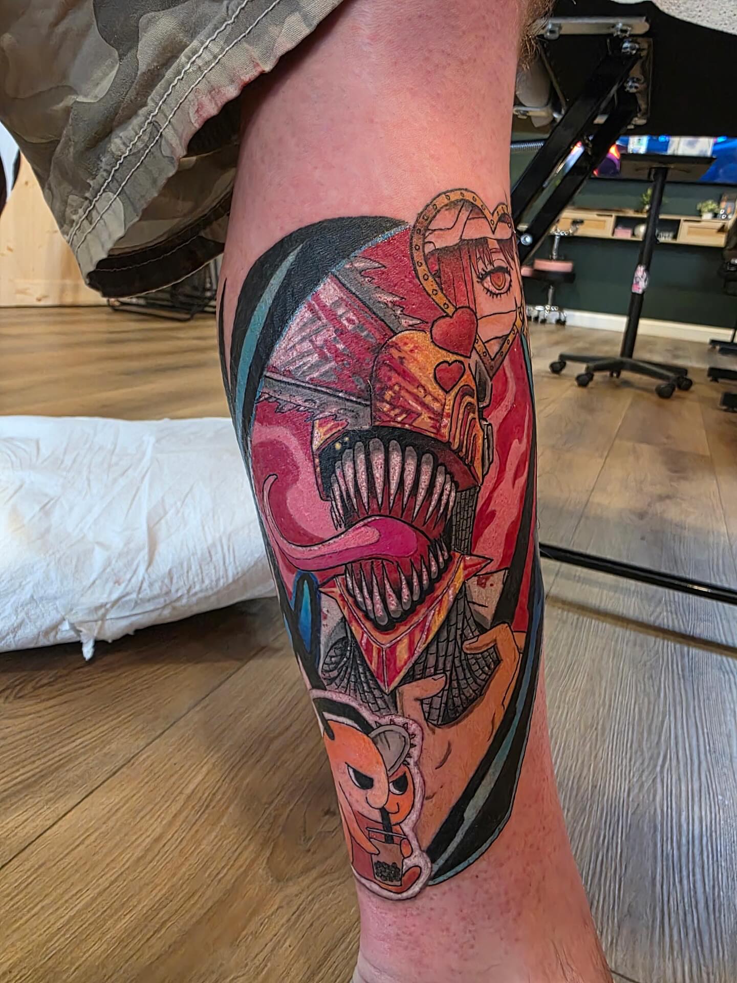 Cyborg neo-traditional tattoo on the calf by Krystal Harris
