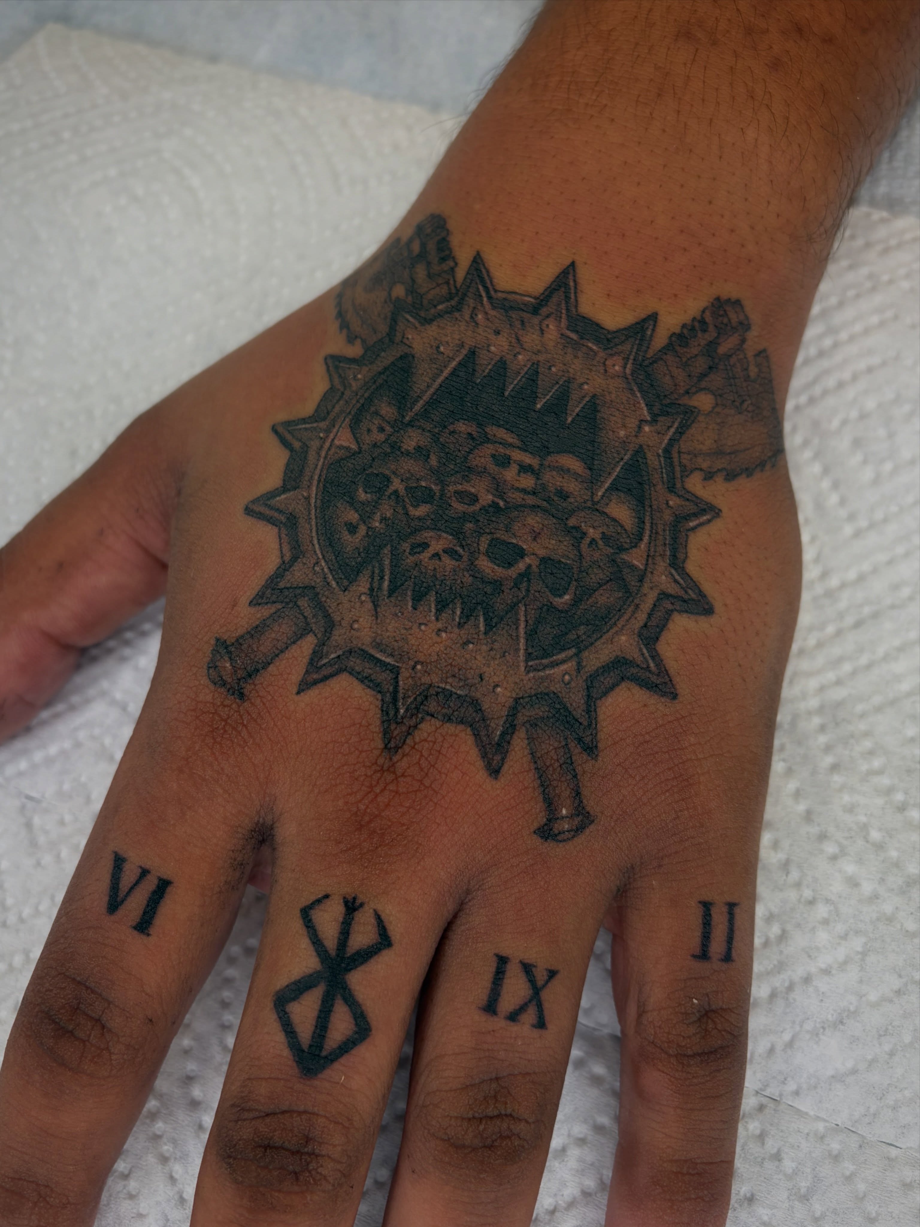 Mechanical gear with skulls black and grey tattoo on the hand by san diego tattoo artist ✩, San Diego, California