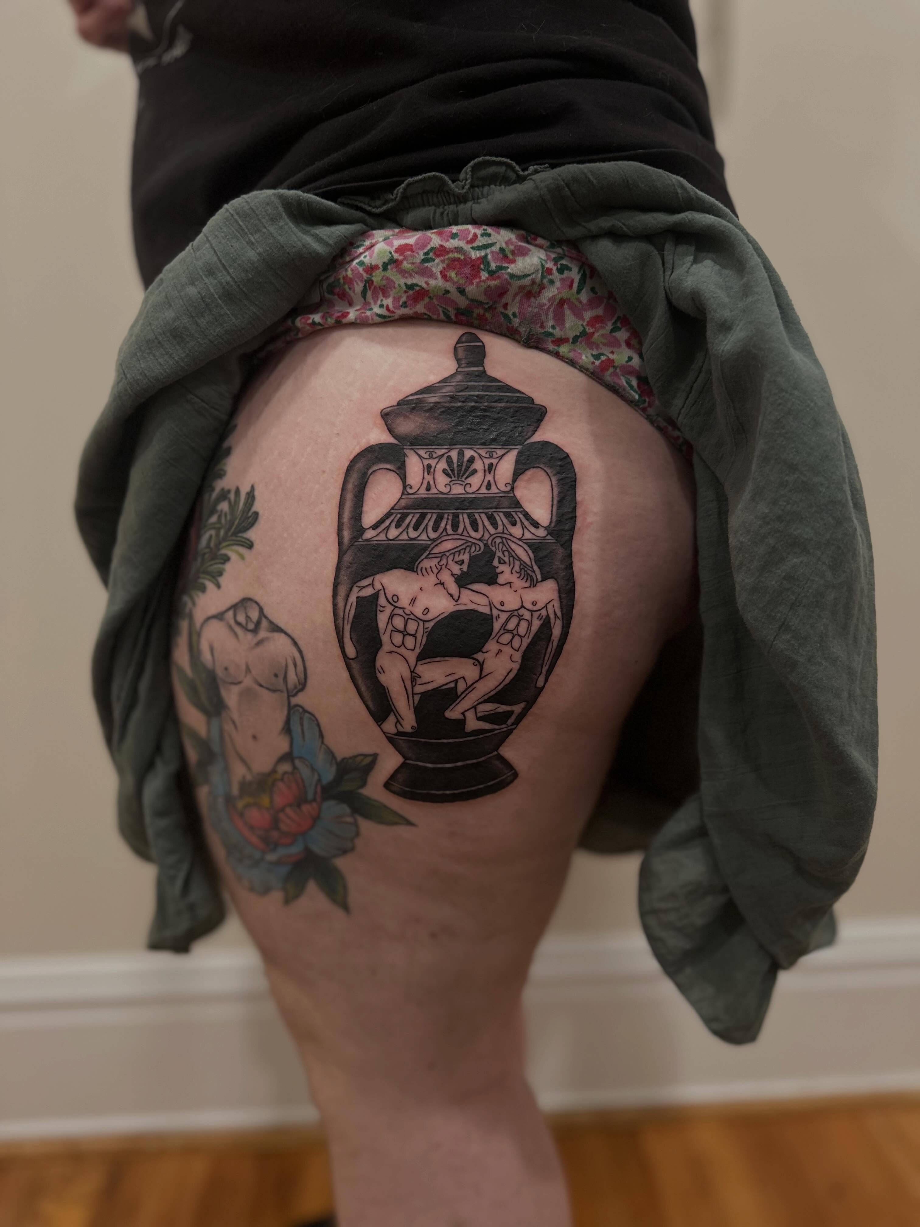 Ancient amphora black and grey tattoo on the thigh by Micha Sol