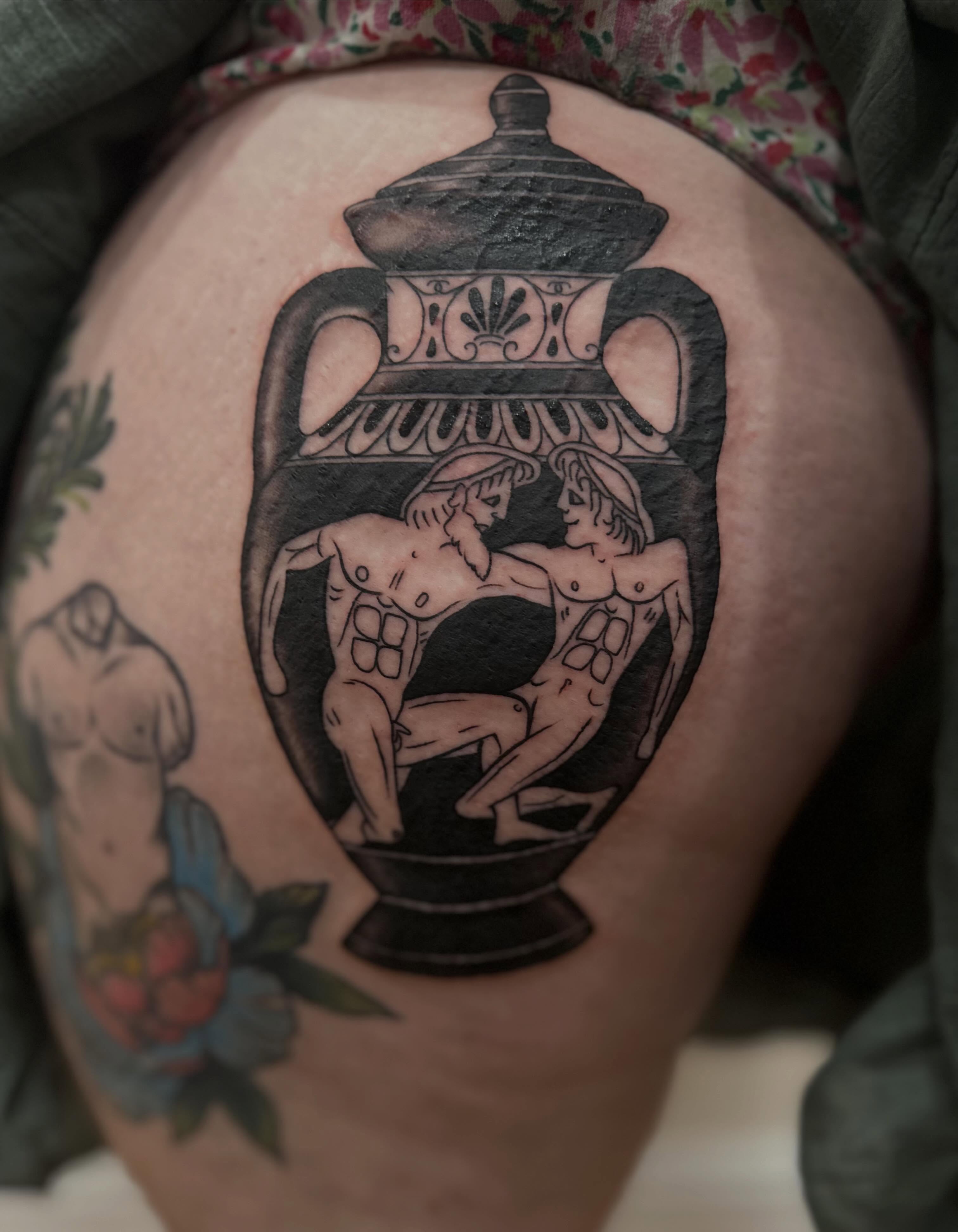 Ancient amphora with figures black and grey tattoo on the torso by Micha Sol