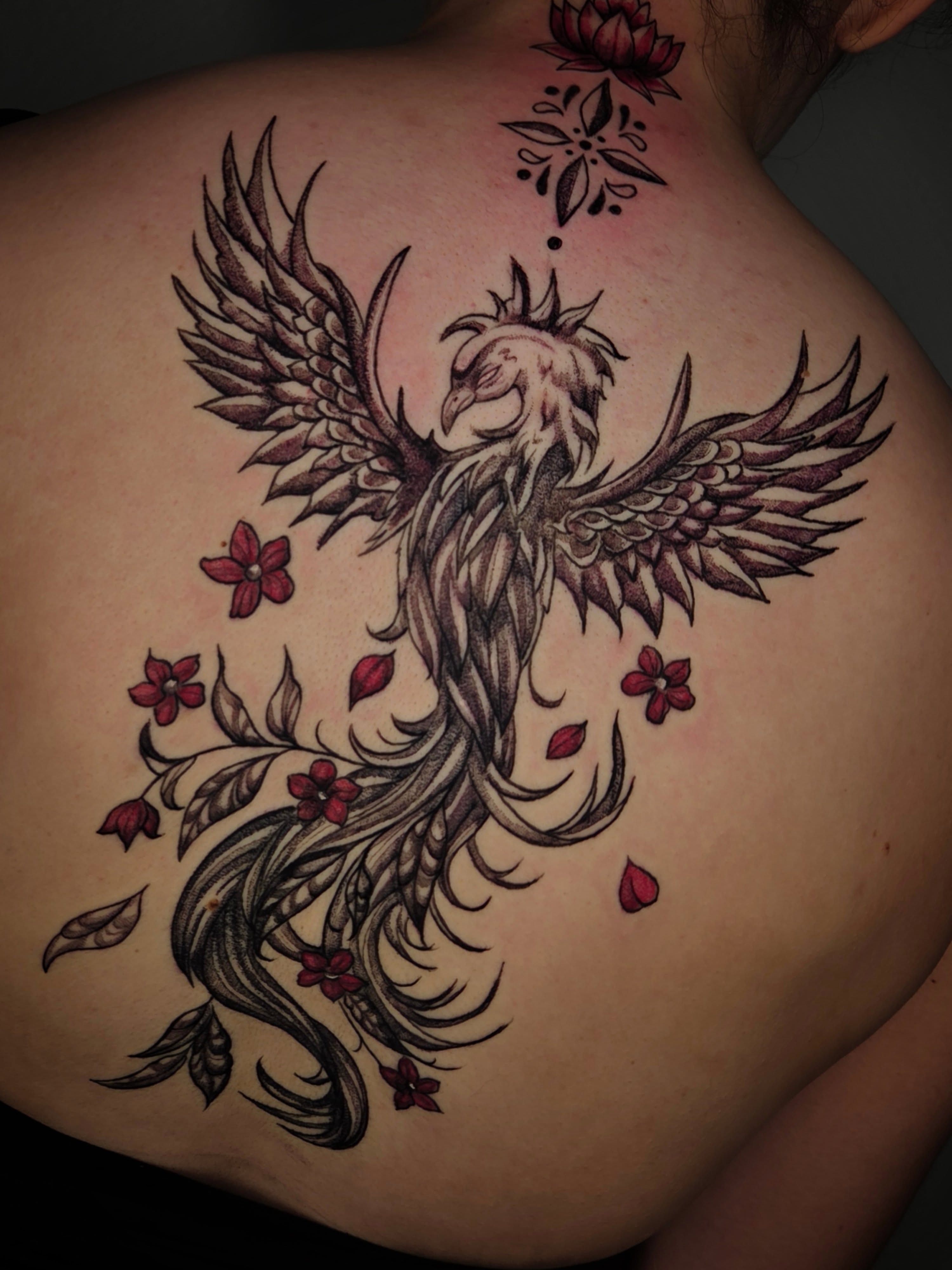 Phoenix black and grey tattoo on the back by Devin 🖤