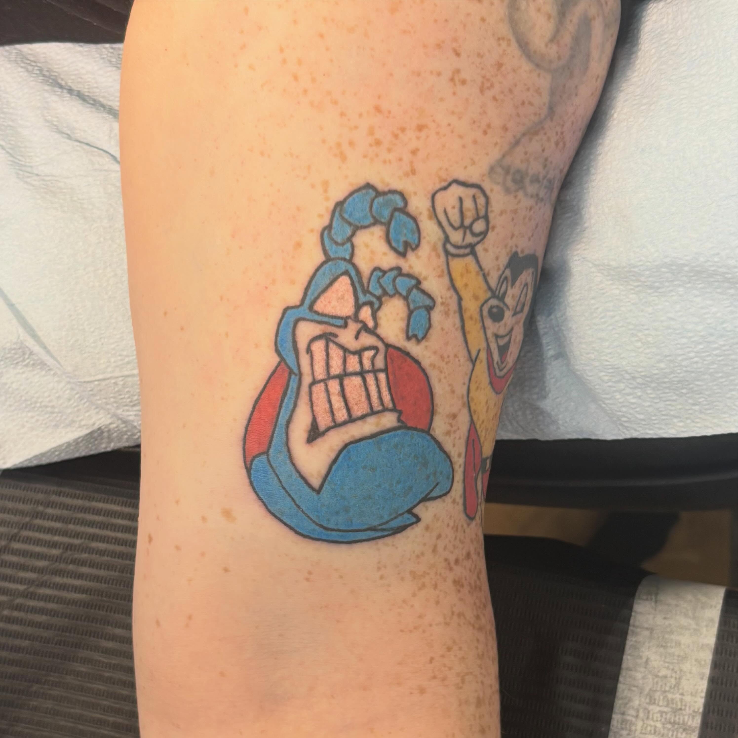 Cartoon character dotwork tattoo on the forearm by Natalie Jade Shupe