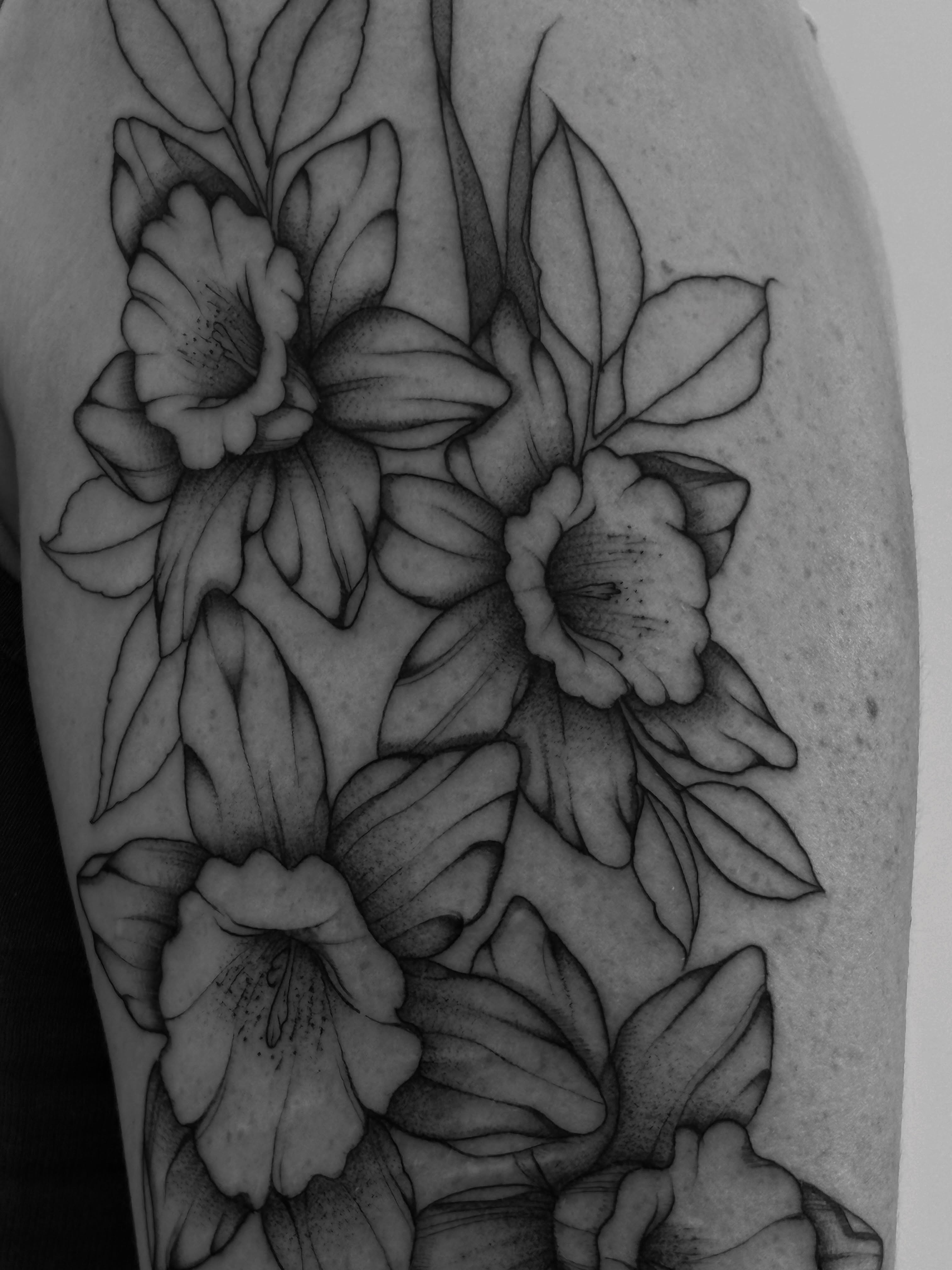 Flowers black and grey tattoo on the forearm by Tayler, Tooele, Utah