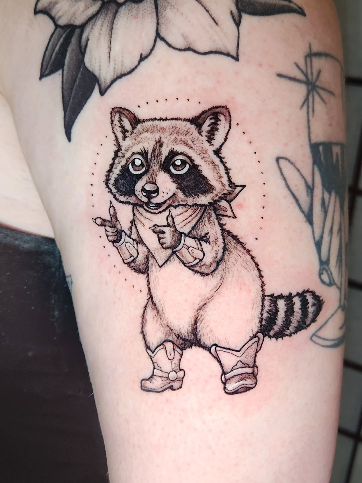 Raccoon in bow tie dotwork tattoo on the forearm by Amanda Boyd - Duh!