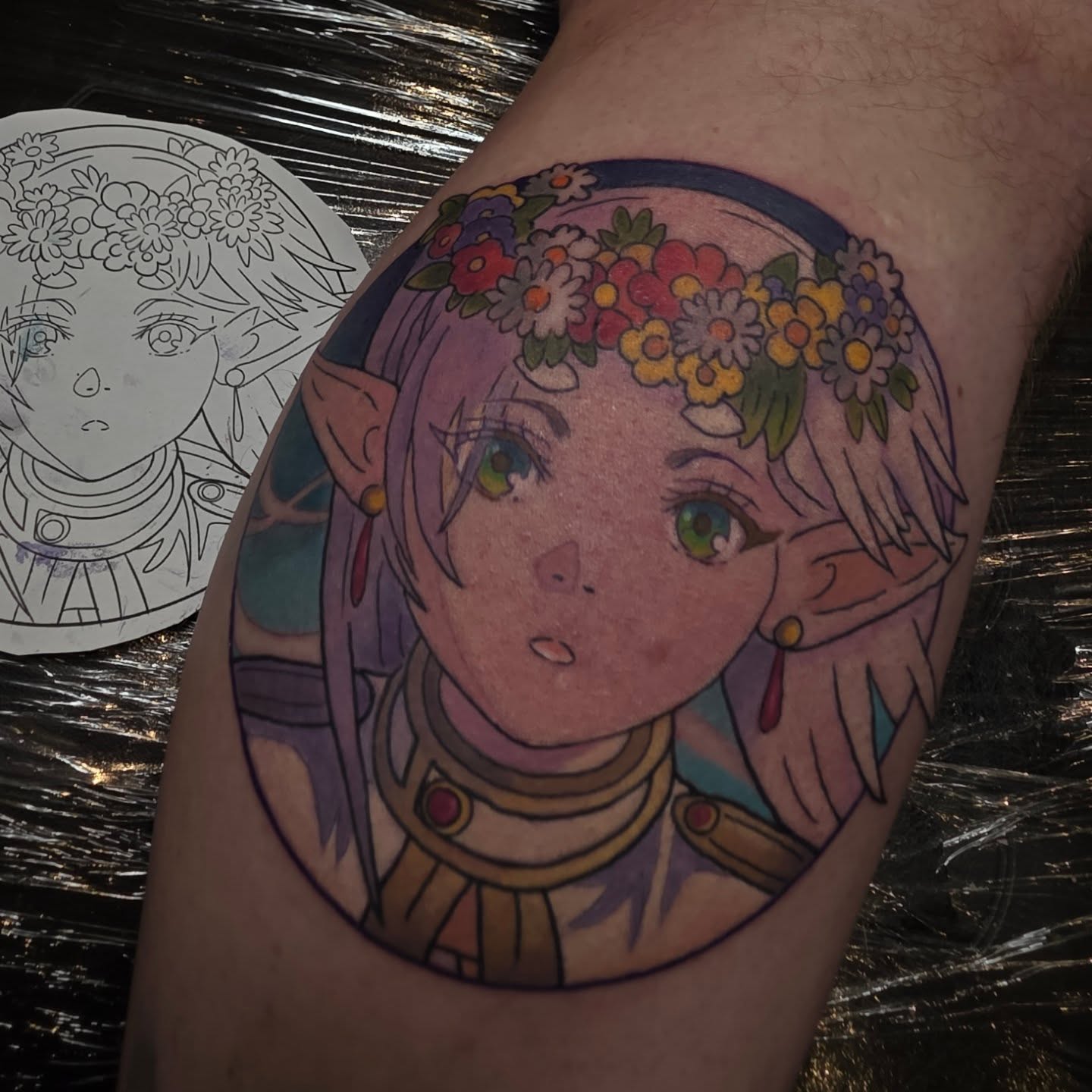 Elf with flower crown anime tattoo on the thigh by Kayla Williams