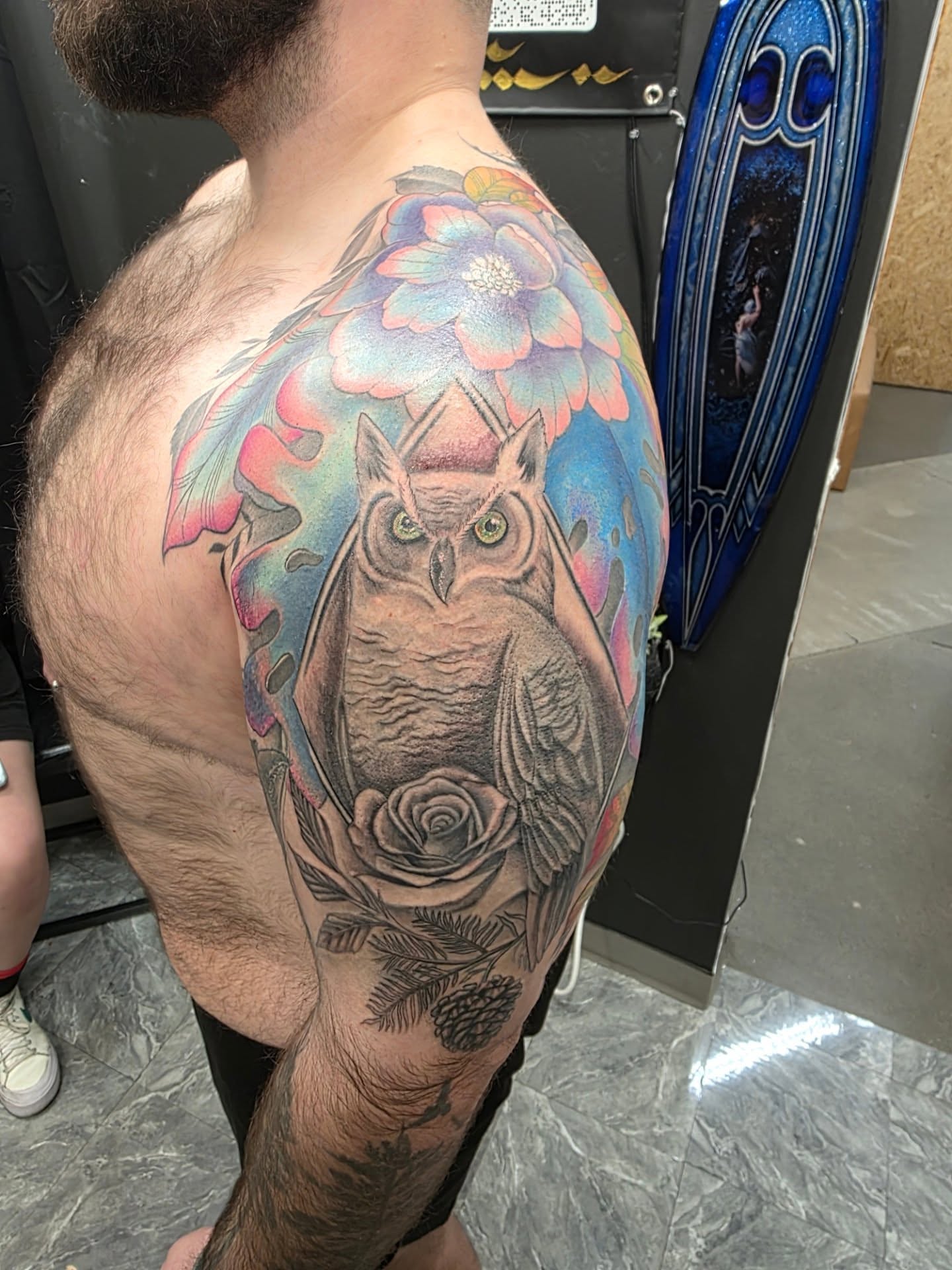 Owl and floral realism tattoo on the shoulder by Claudia Isabel Roman, El Paso, Texas