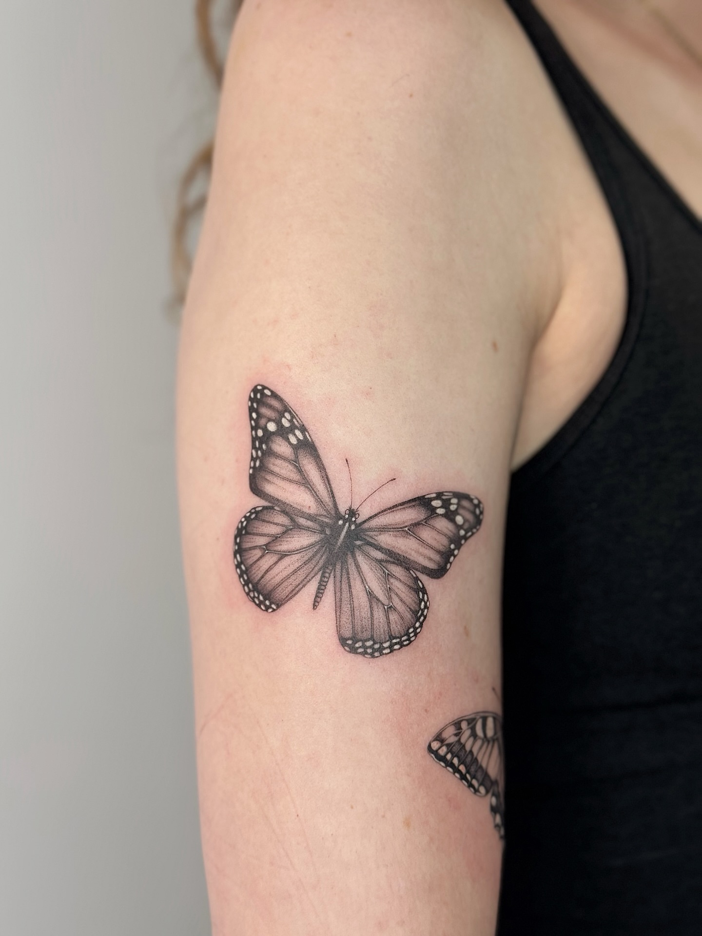 Butterfly realism tattoo on the forearm by Lea Burkard, Berkeley, California