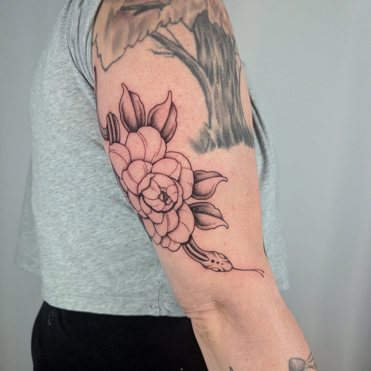Peony flower black and grey tattoo on the forearm by Courtney Yaddof