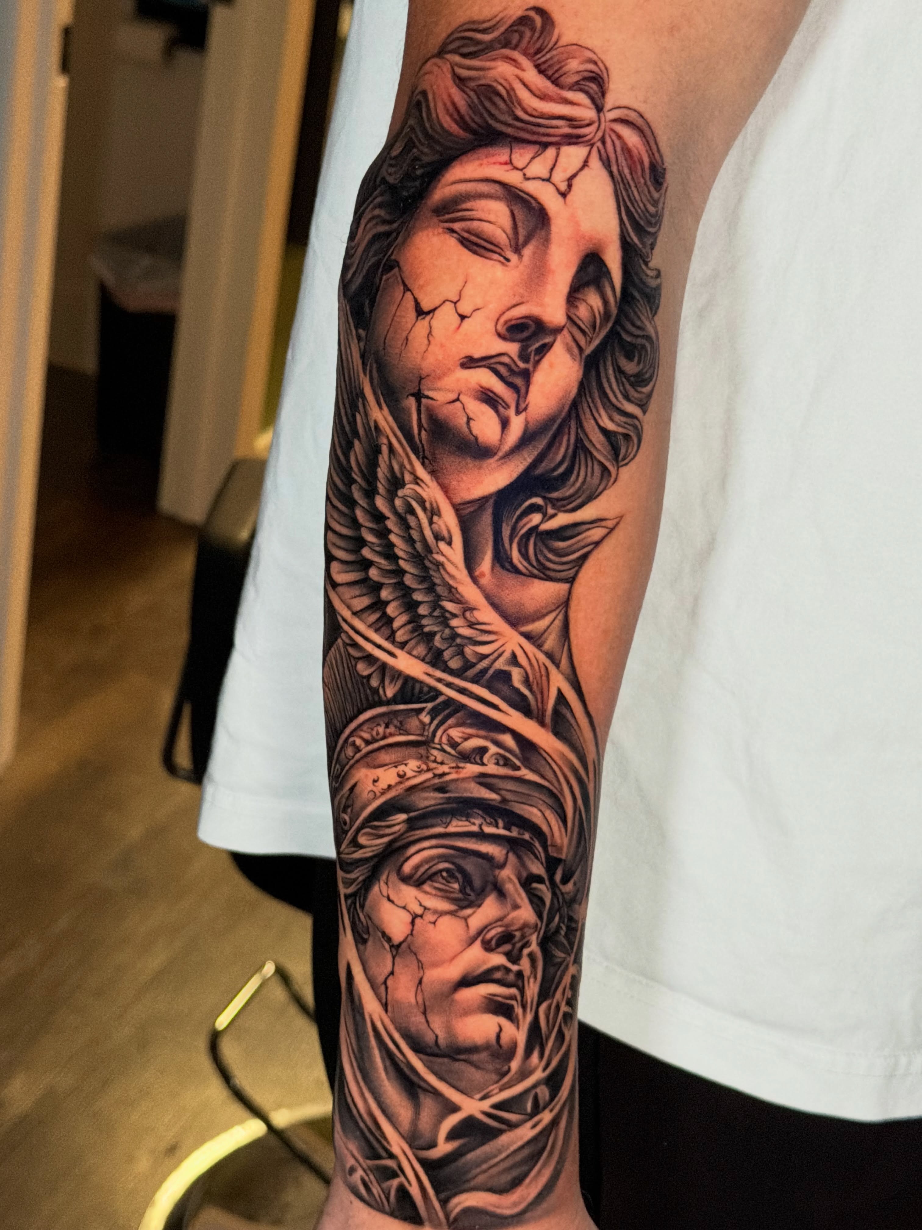 Tattoo by @tattooray — black_and_grey, realism