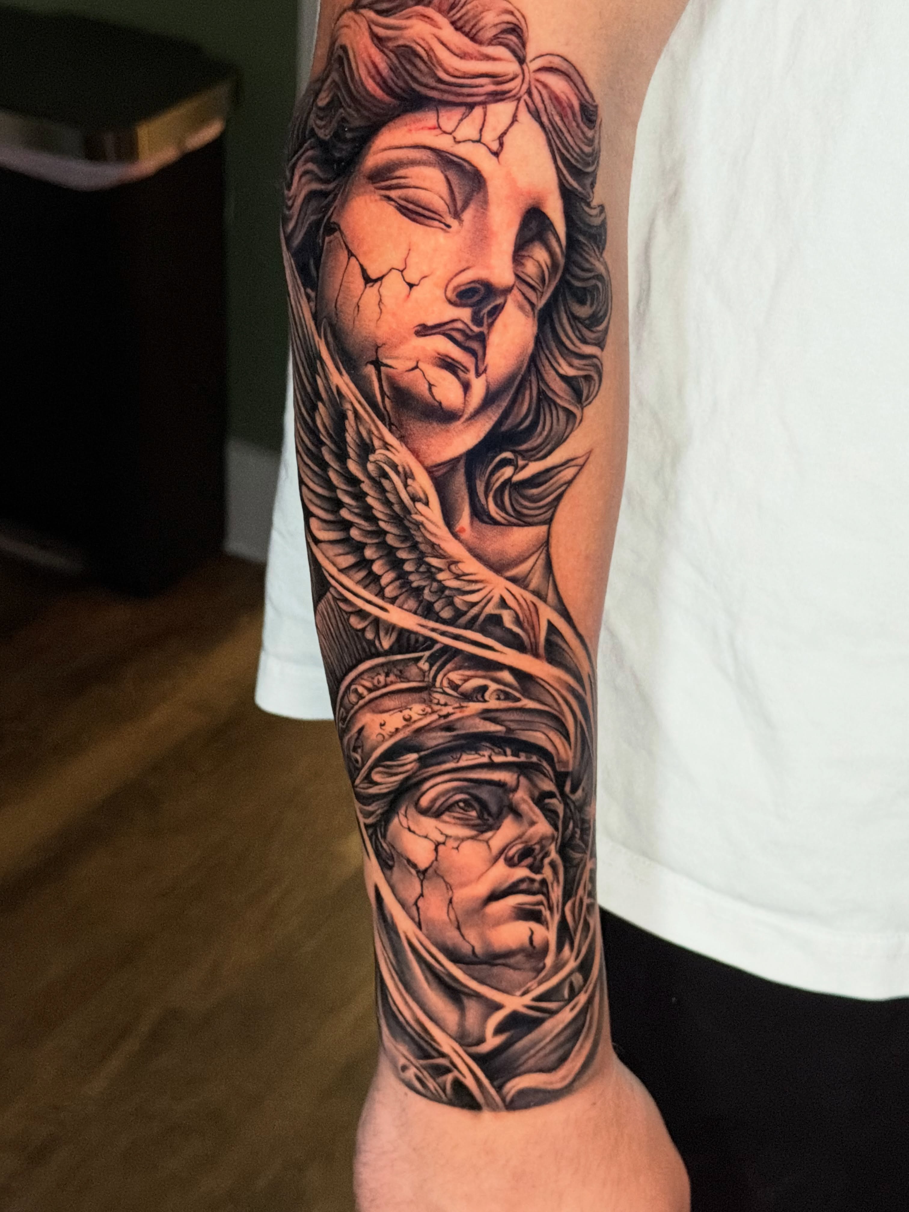 Tattoo by @tattooray — realism, black_and_grey