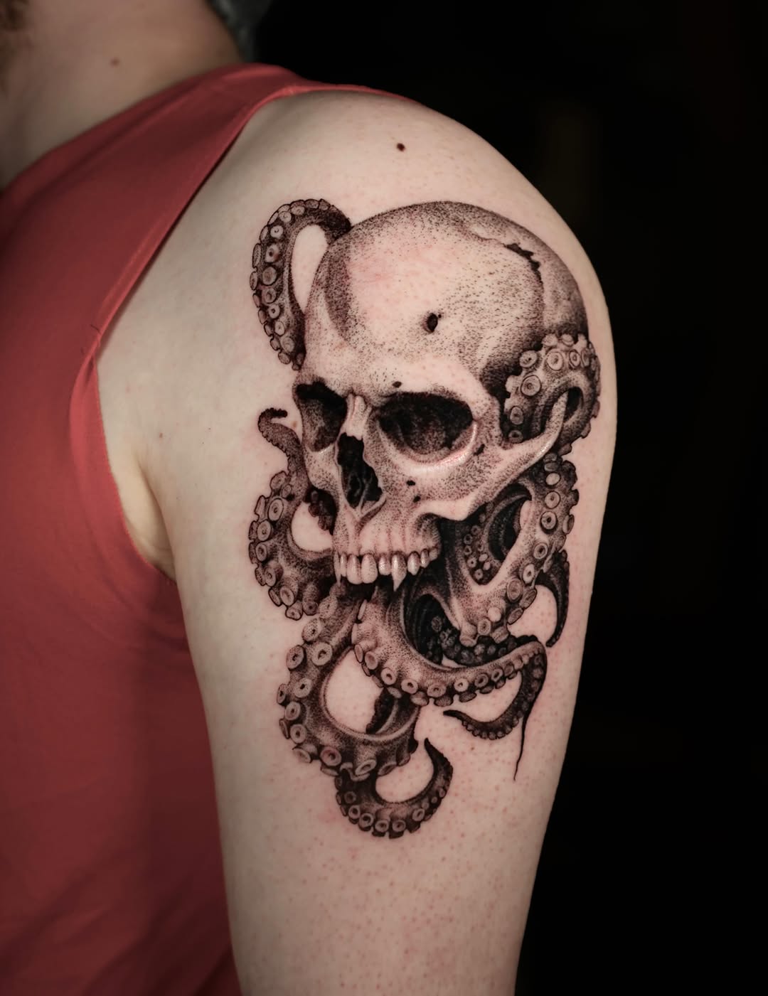 Skull and octopus realism tattoo on the shoulder by Anna Chernova, San Francisco, California