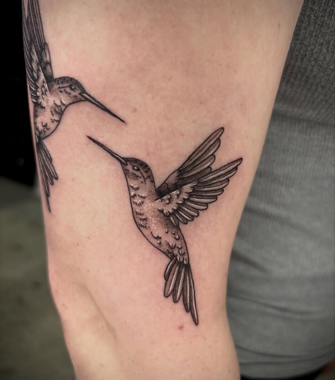 Hummingbird black and grey tattoo on the forearm by destiney rose