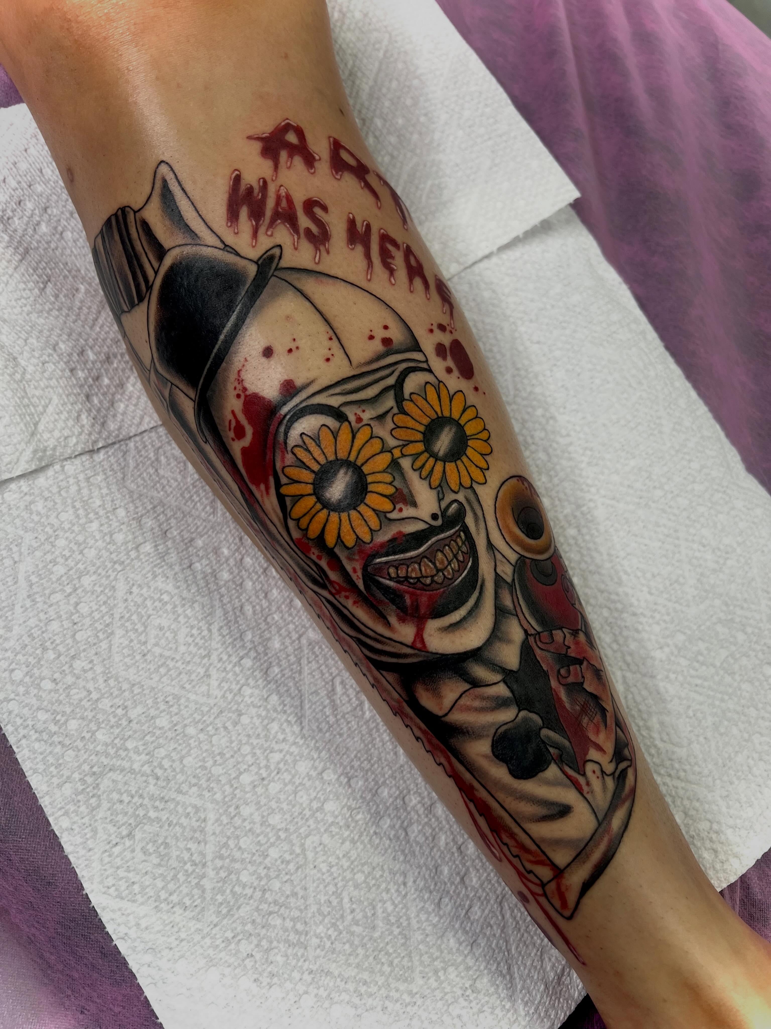 Skull with flowers American traditional tattoo on the forearm by Kahlan ⍟